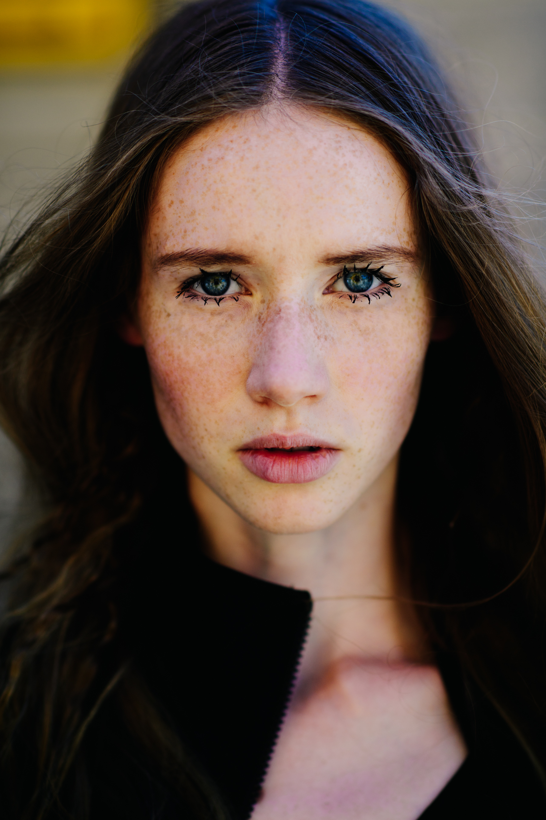 Portrait of a girl with freckles