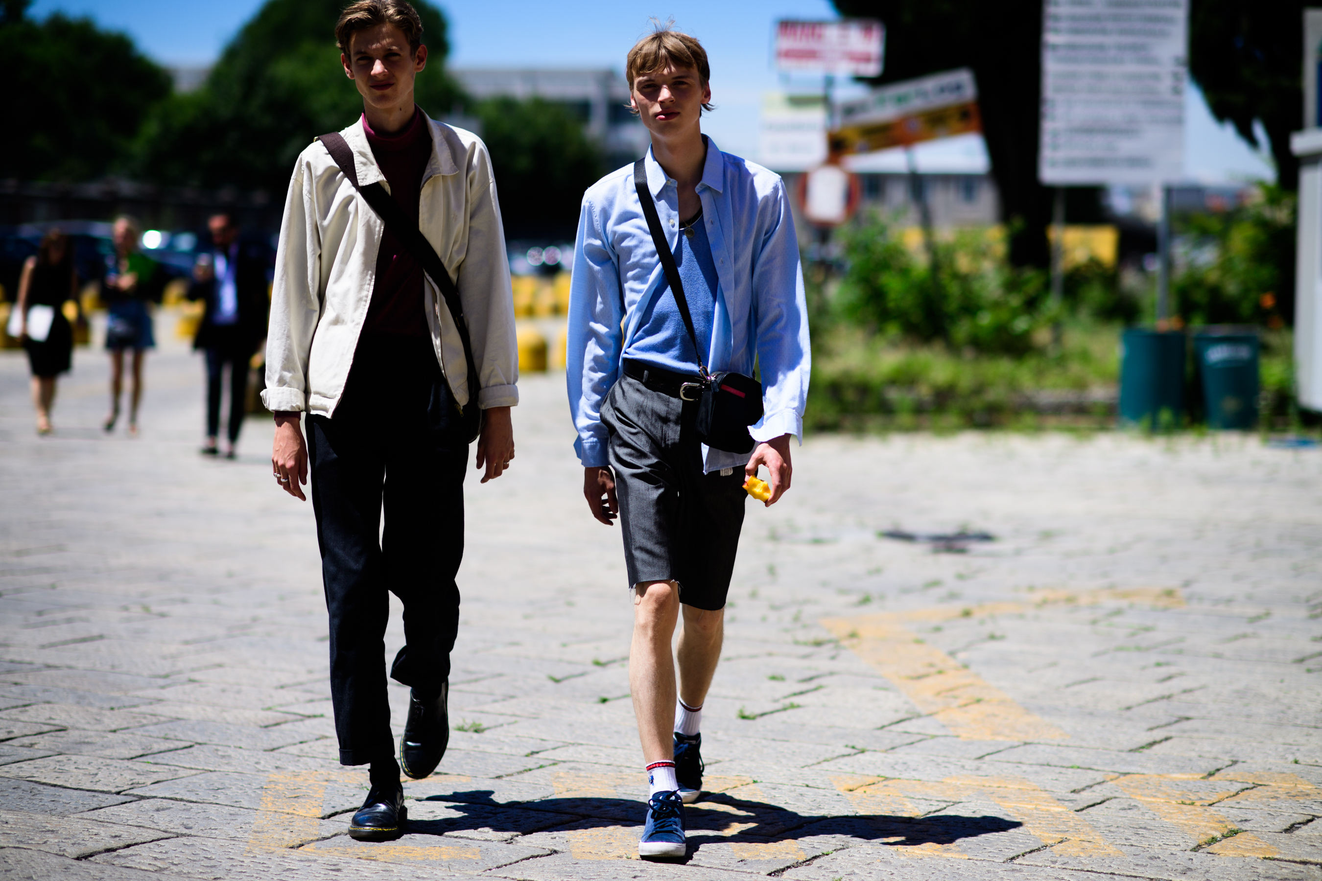Two male models after the show