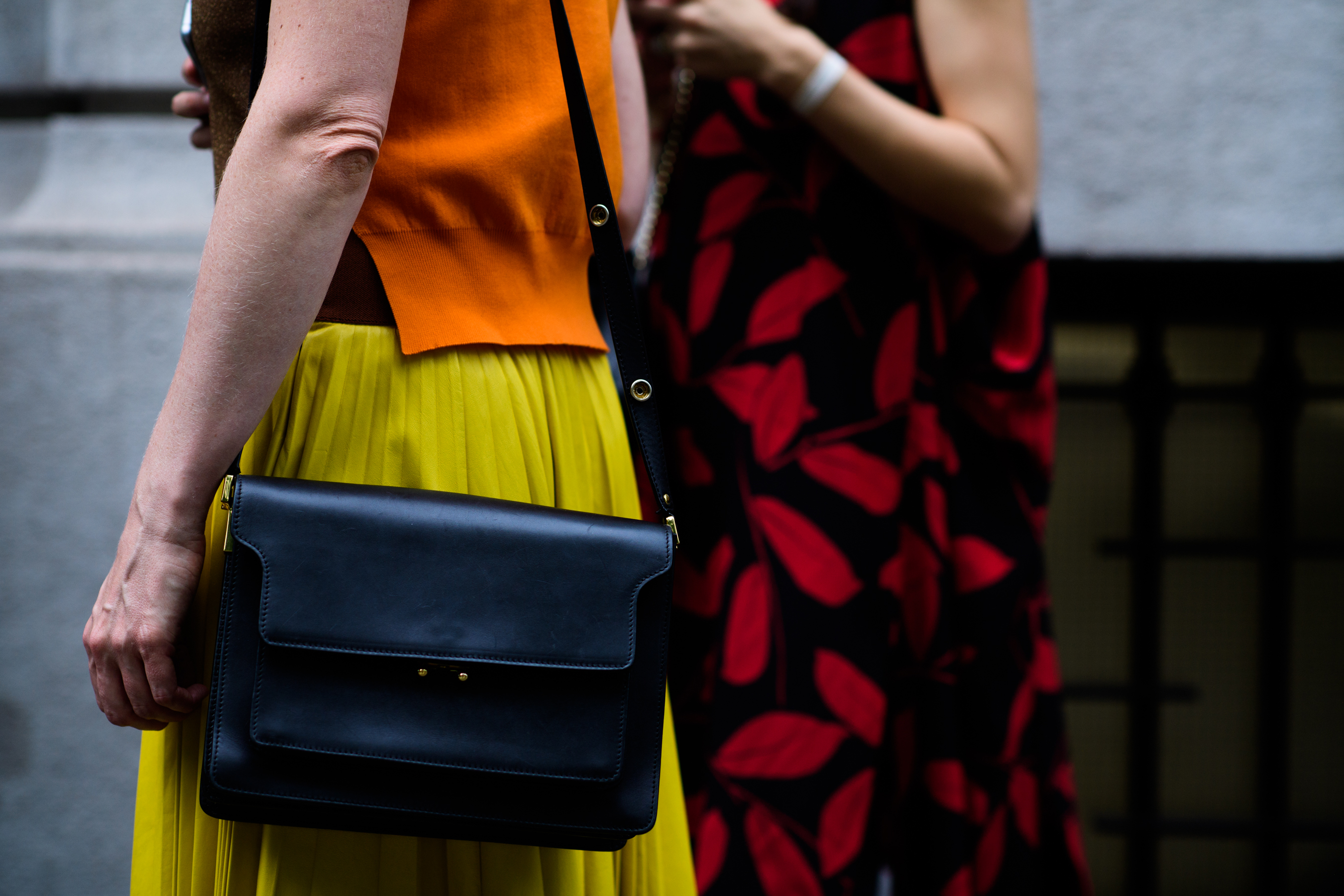 Orange and yellow details of an outfit