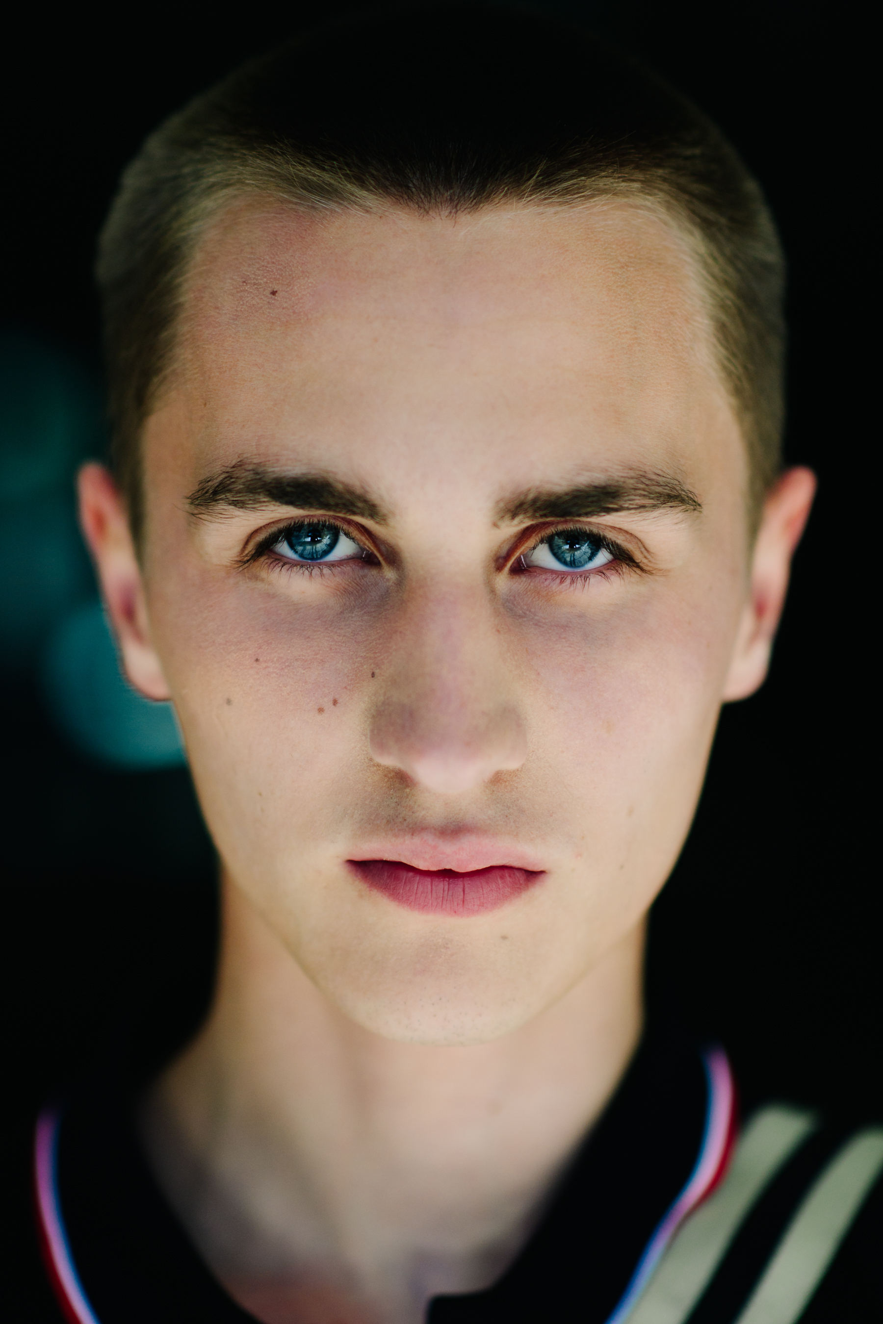 Blue-eyed male mode portrait