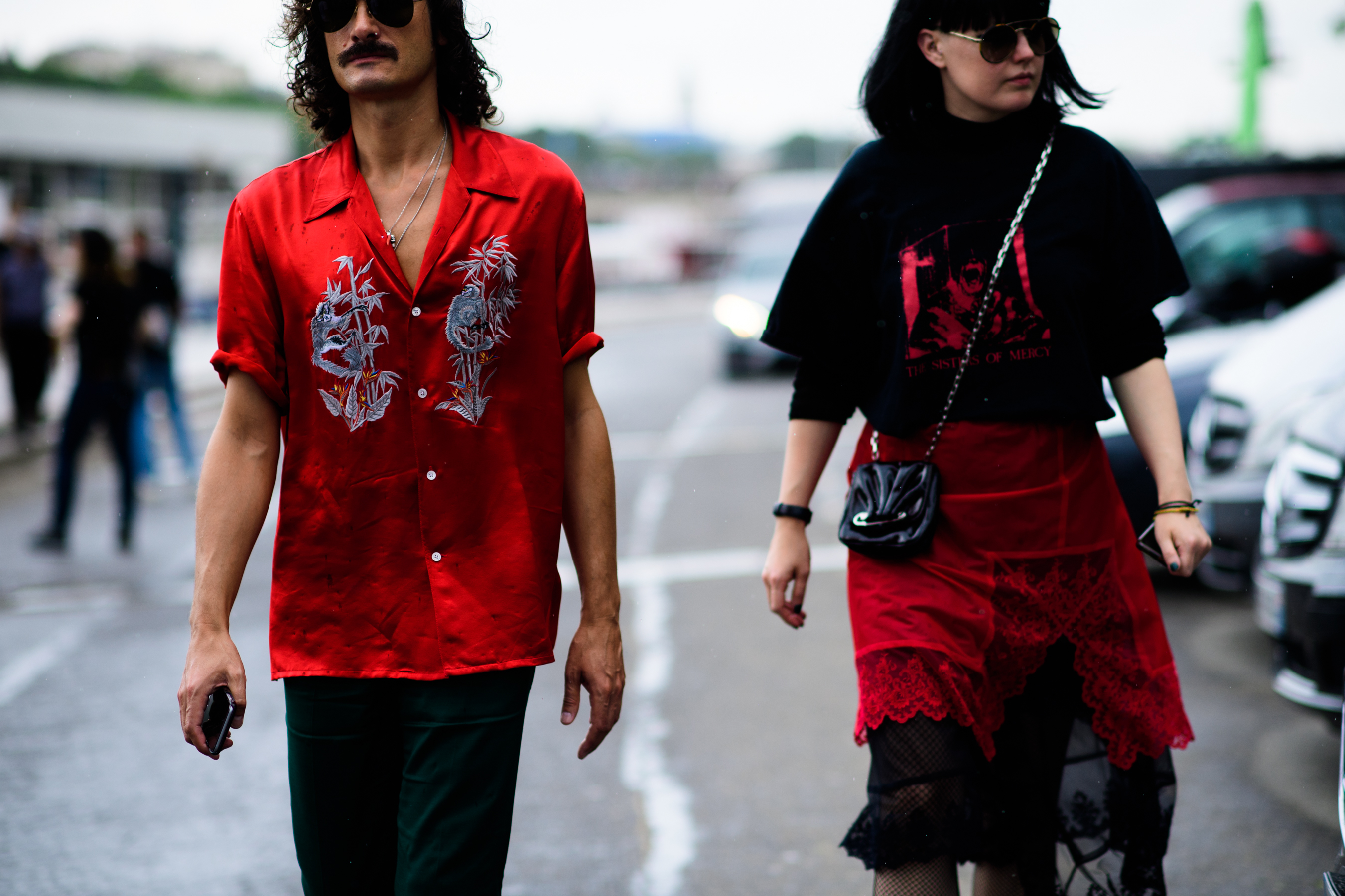 A man and a woman wearing red