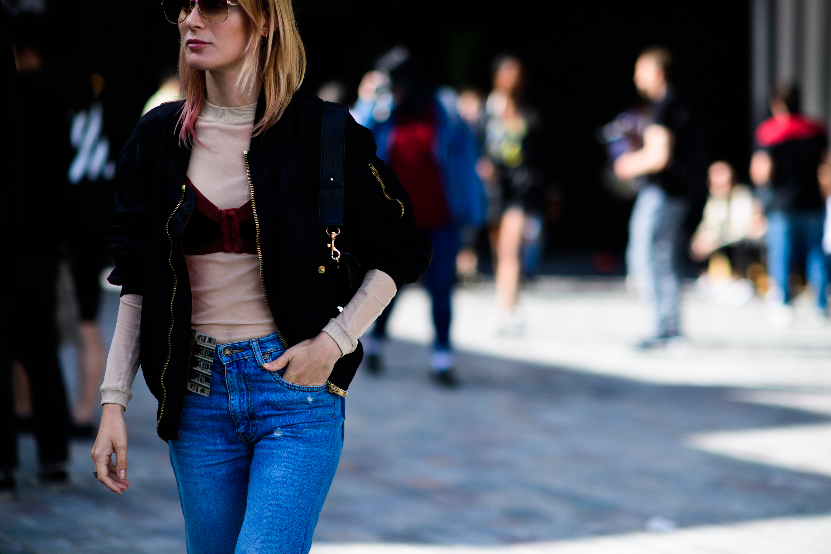 Woman in bralette worn over top