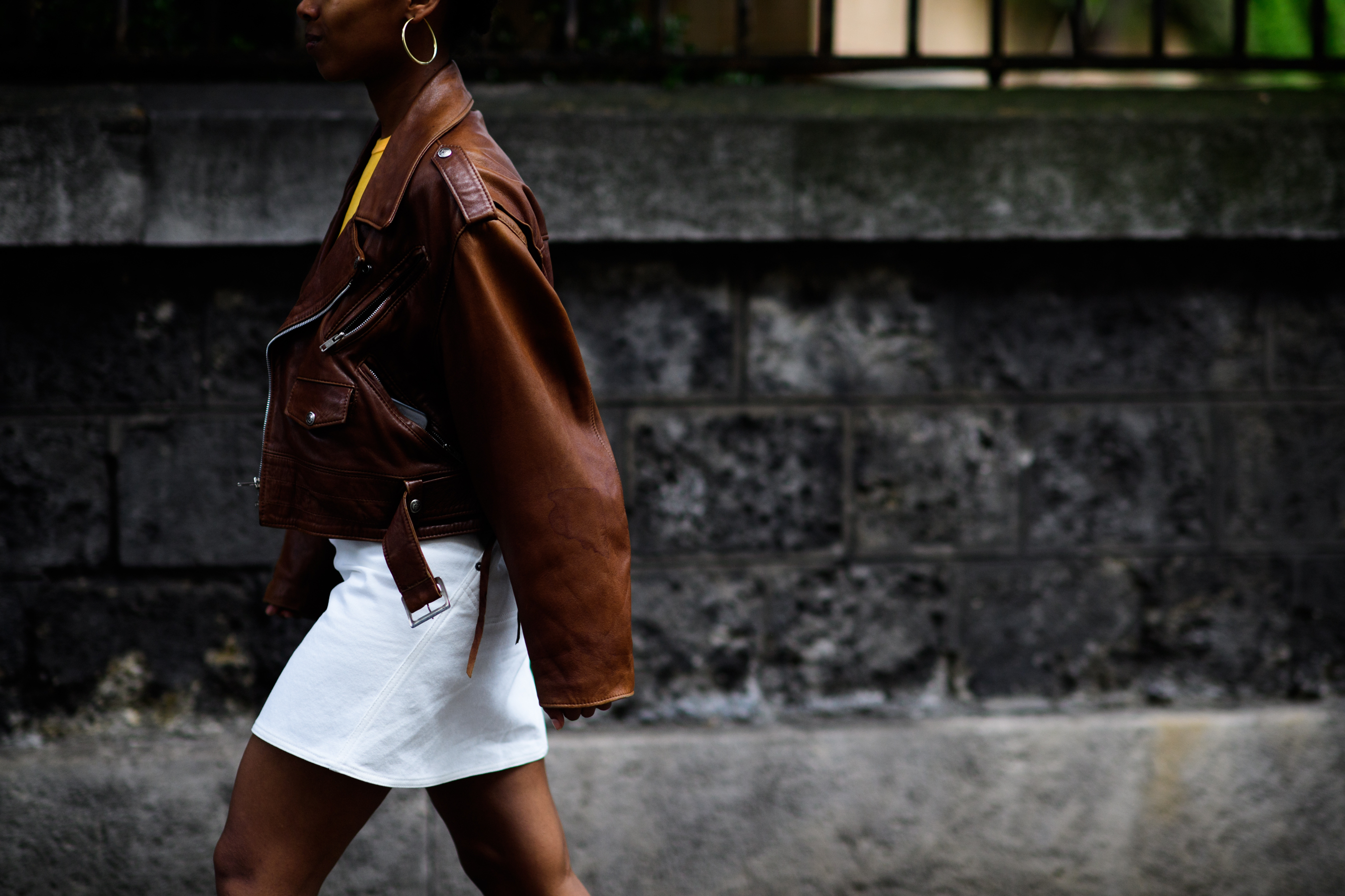 Woman wearing brown leather jacket