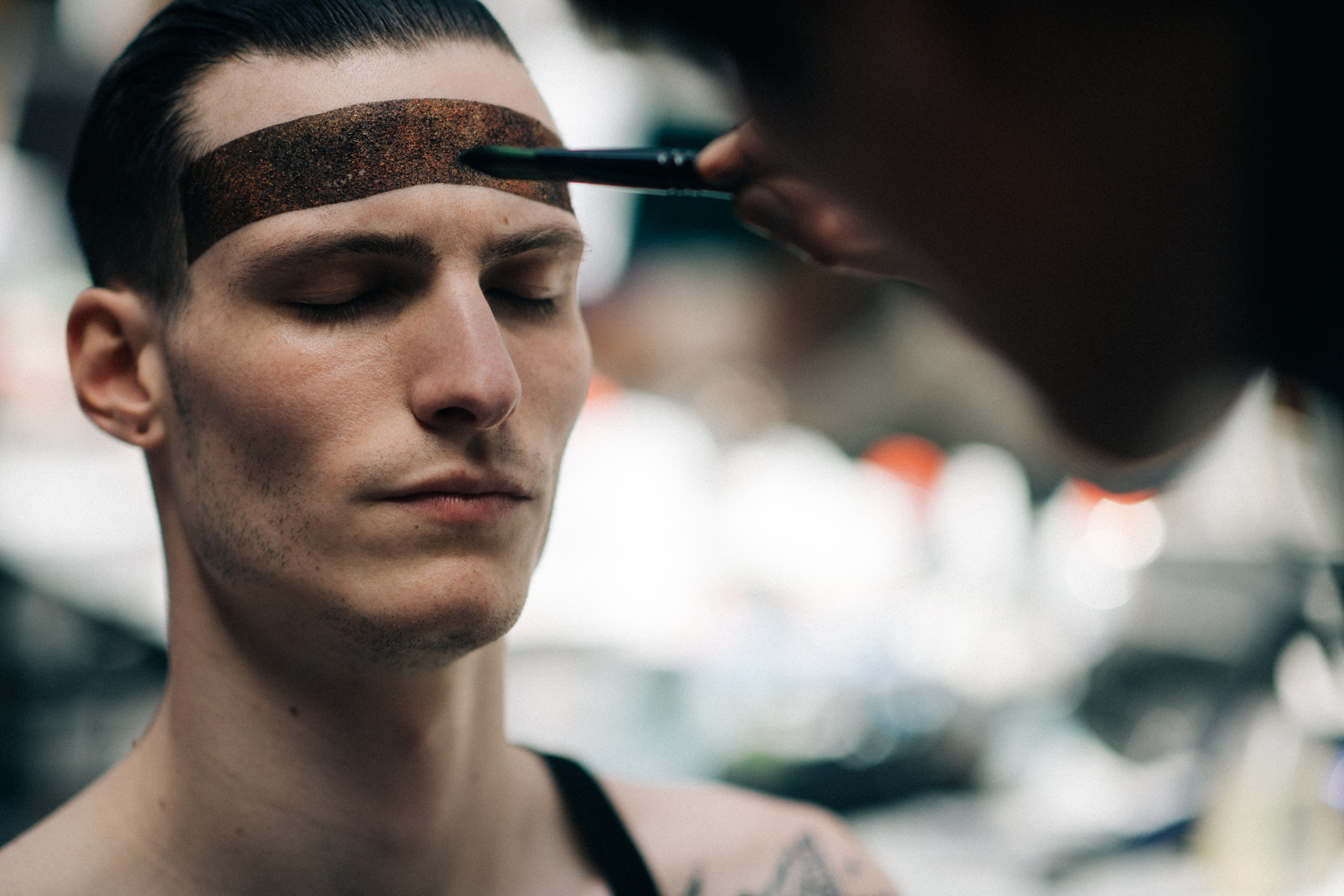 A model getting ready for the show