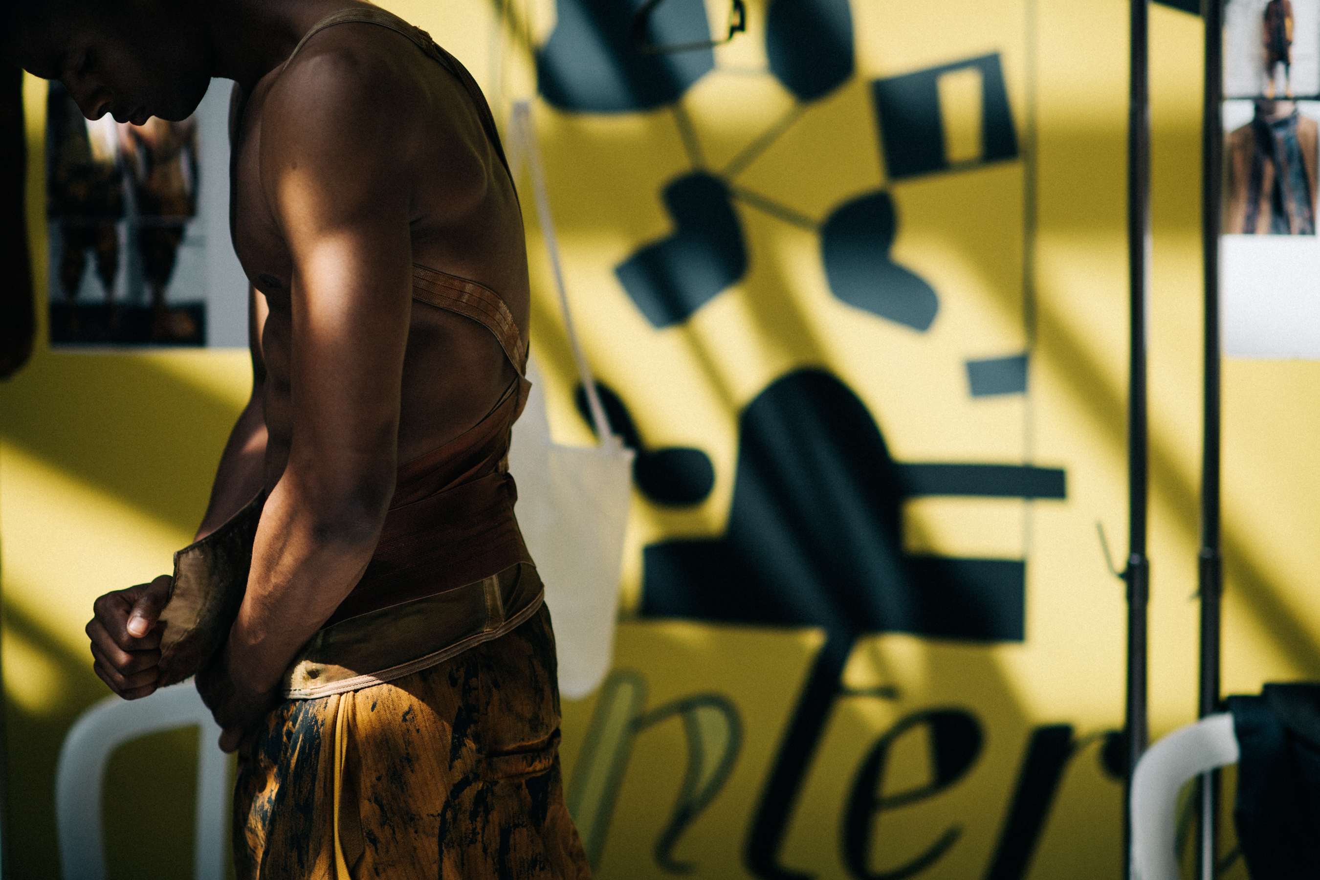 A model in golden trousers