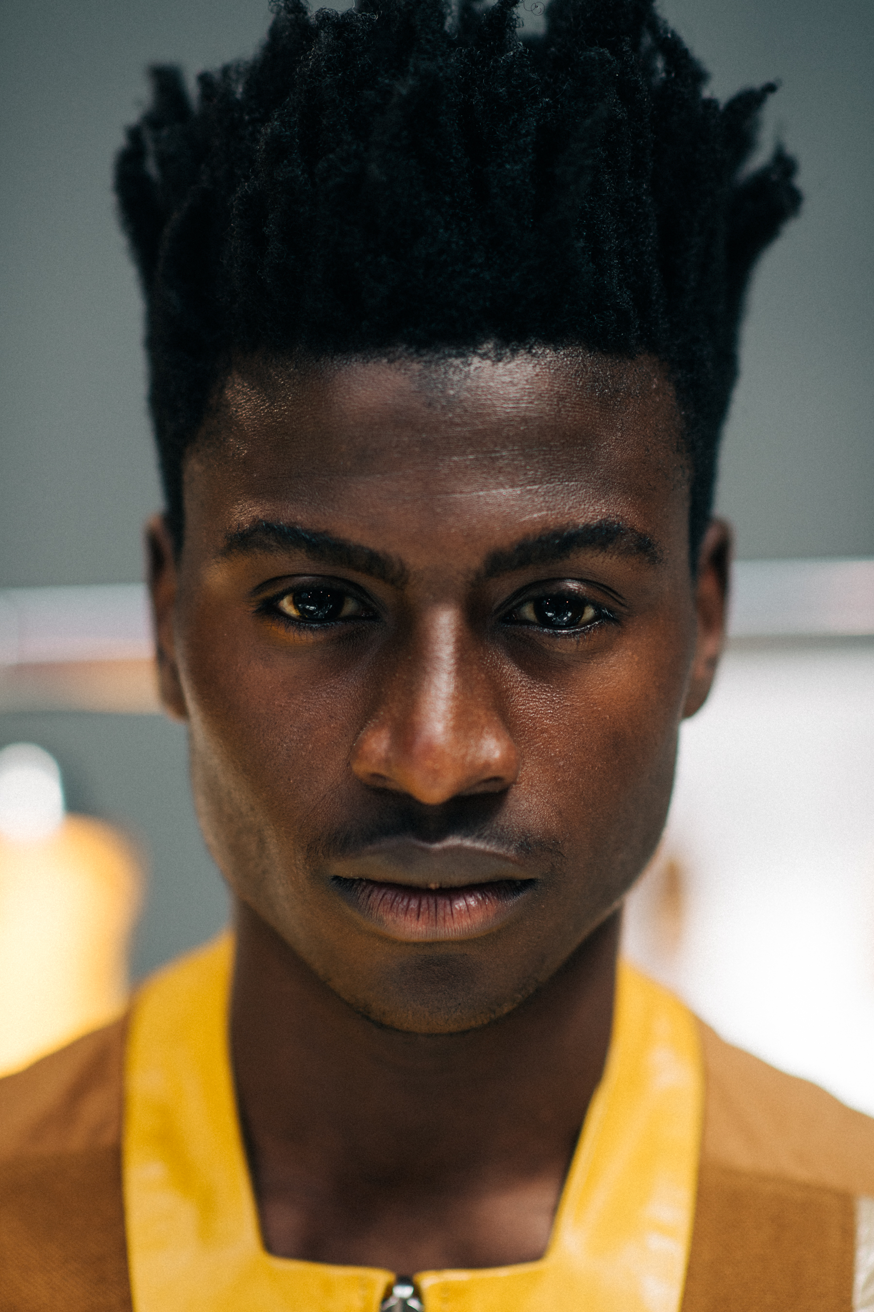 A model posing in yellow clothing