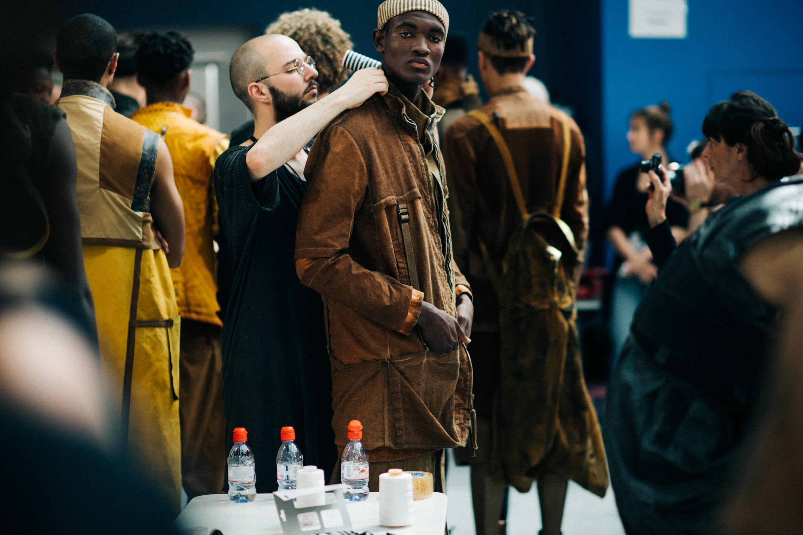 Models in light brown outfits