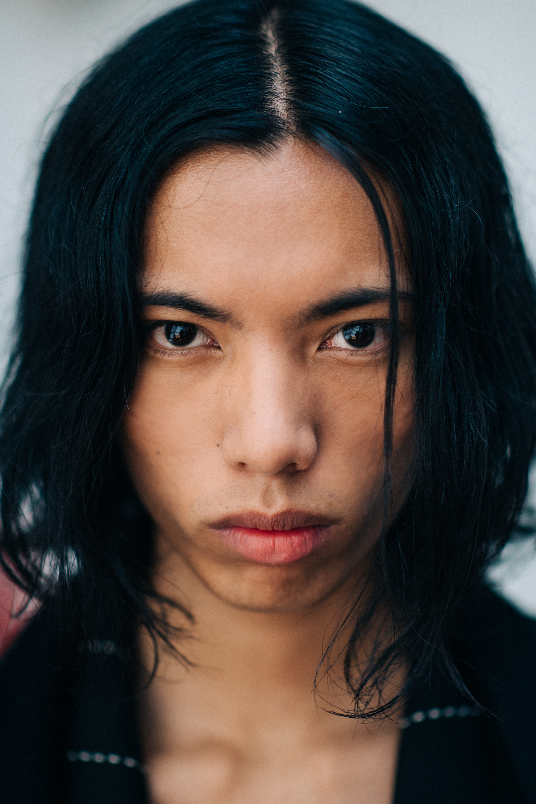 Portrait of long-haired male model