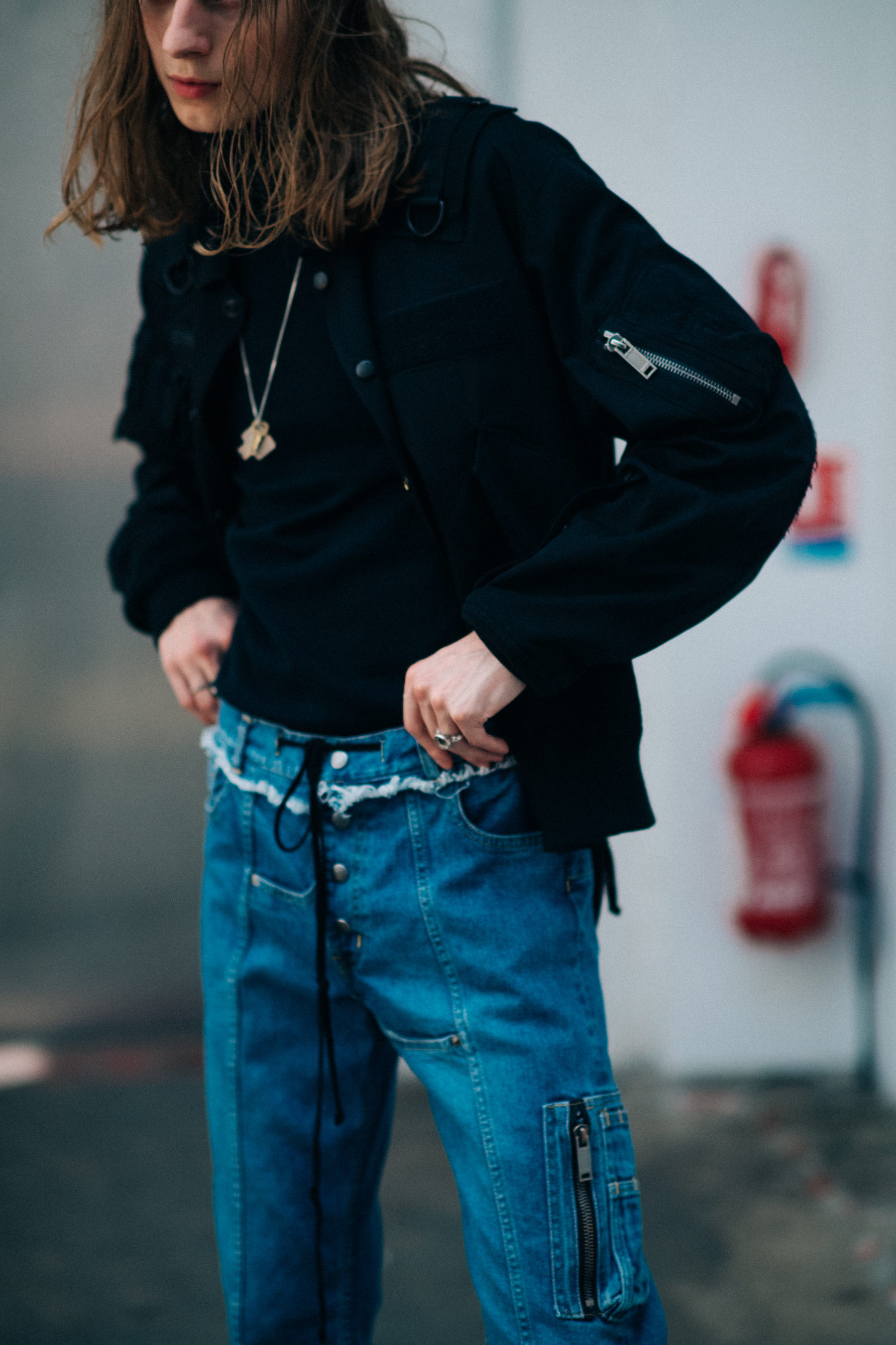 Black jacket worn with denim