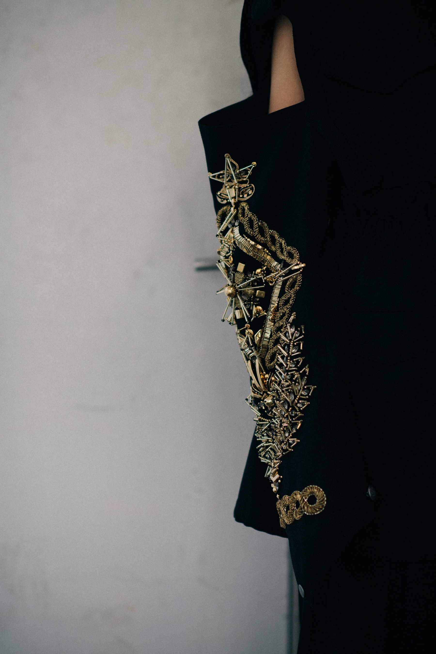 Black jacket with golden embroidery