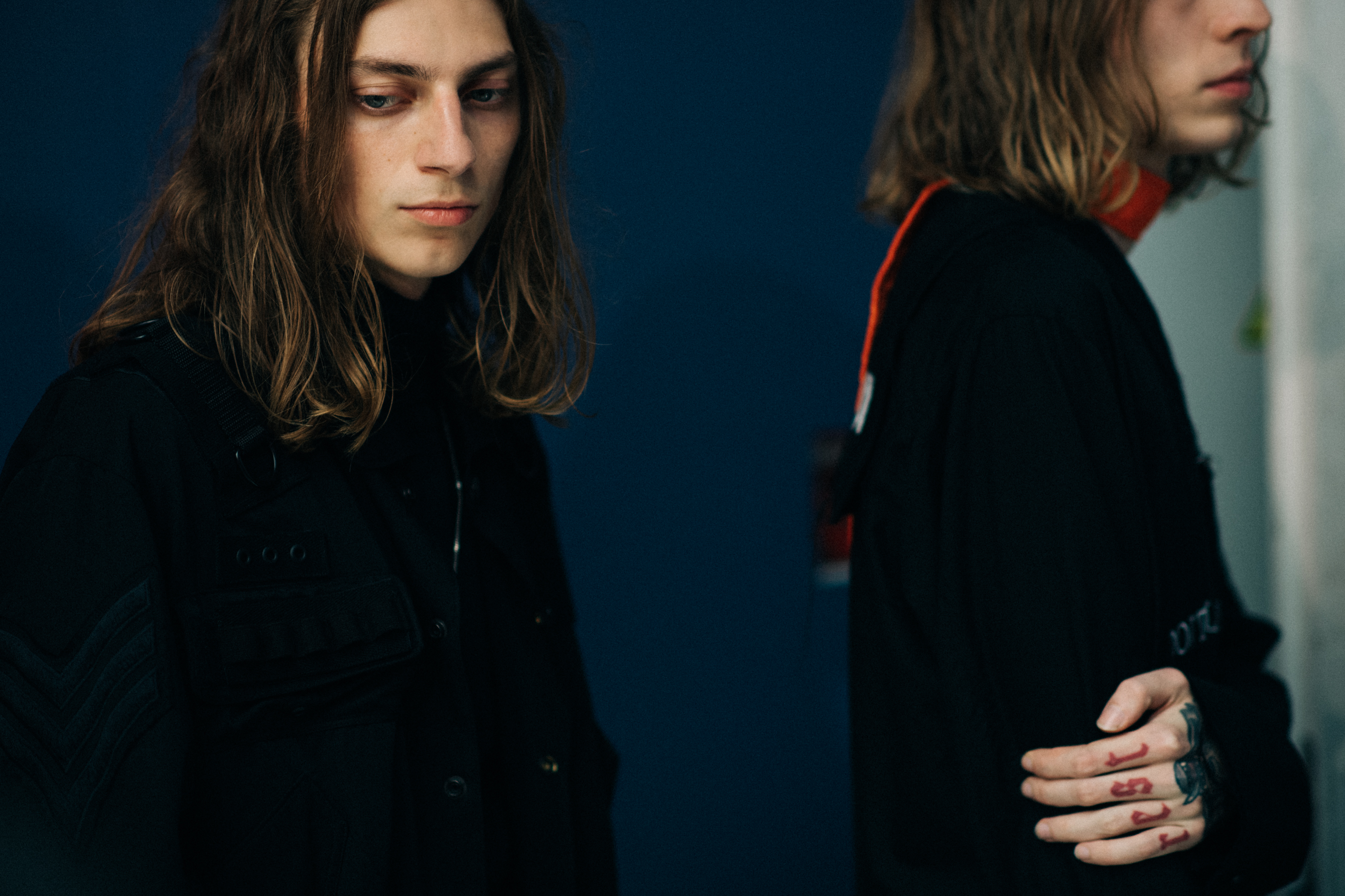 Male models wearing all black