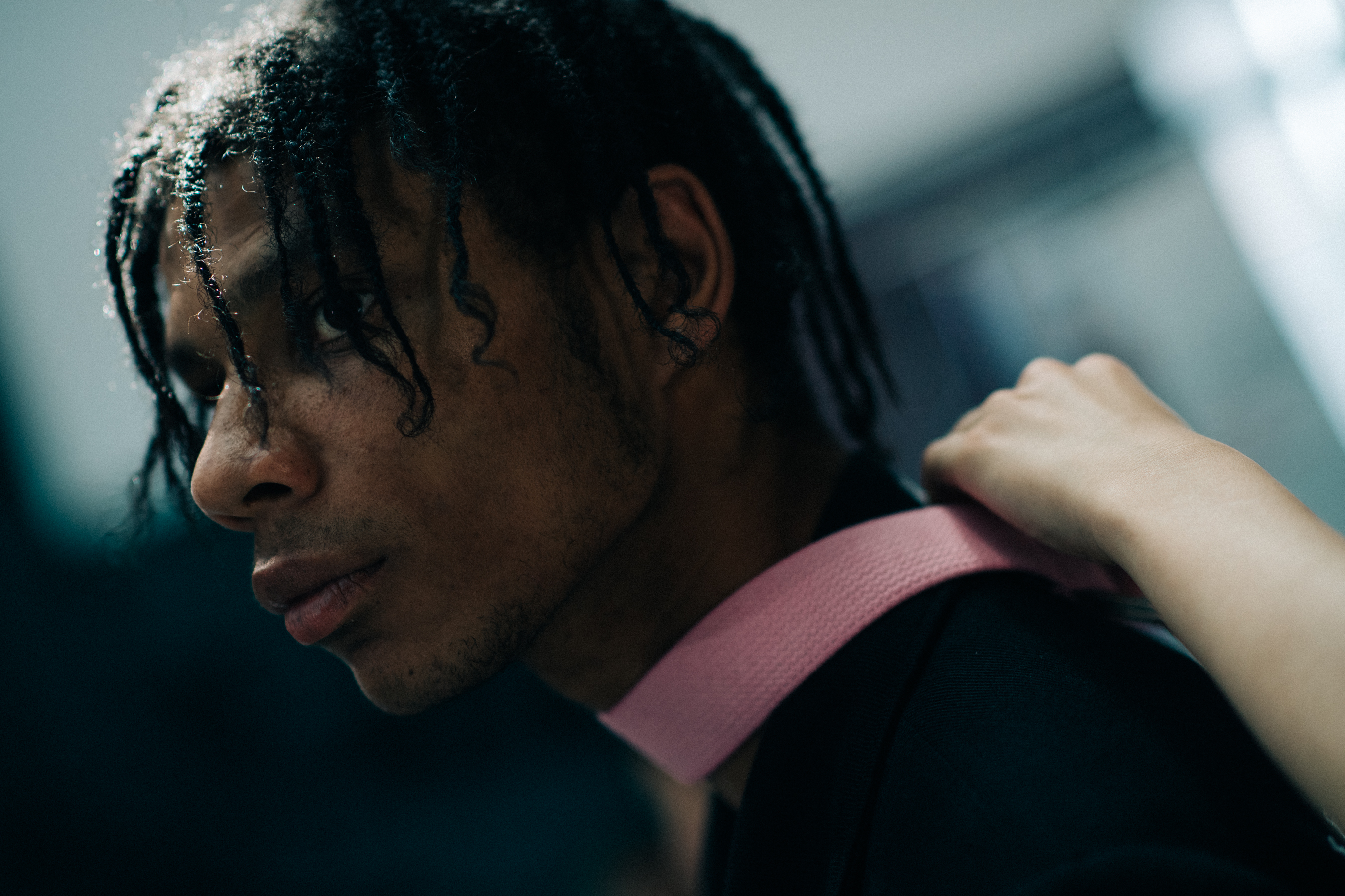 Male model wearing pink collar