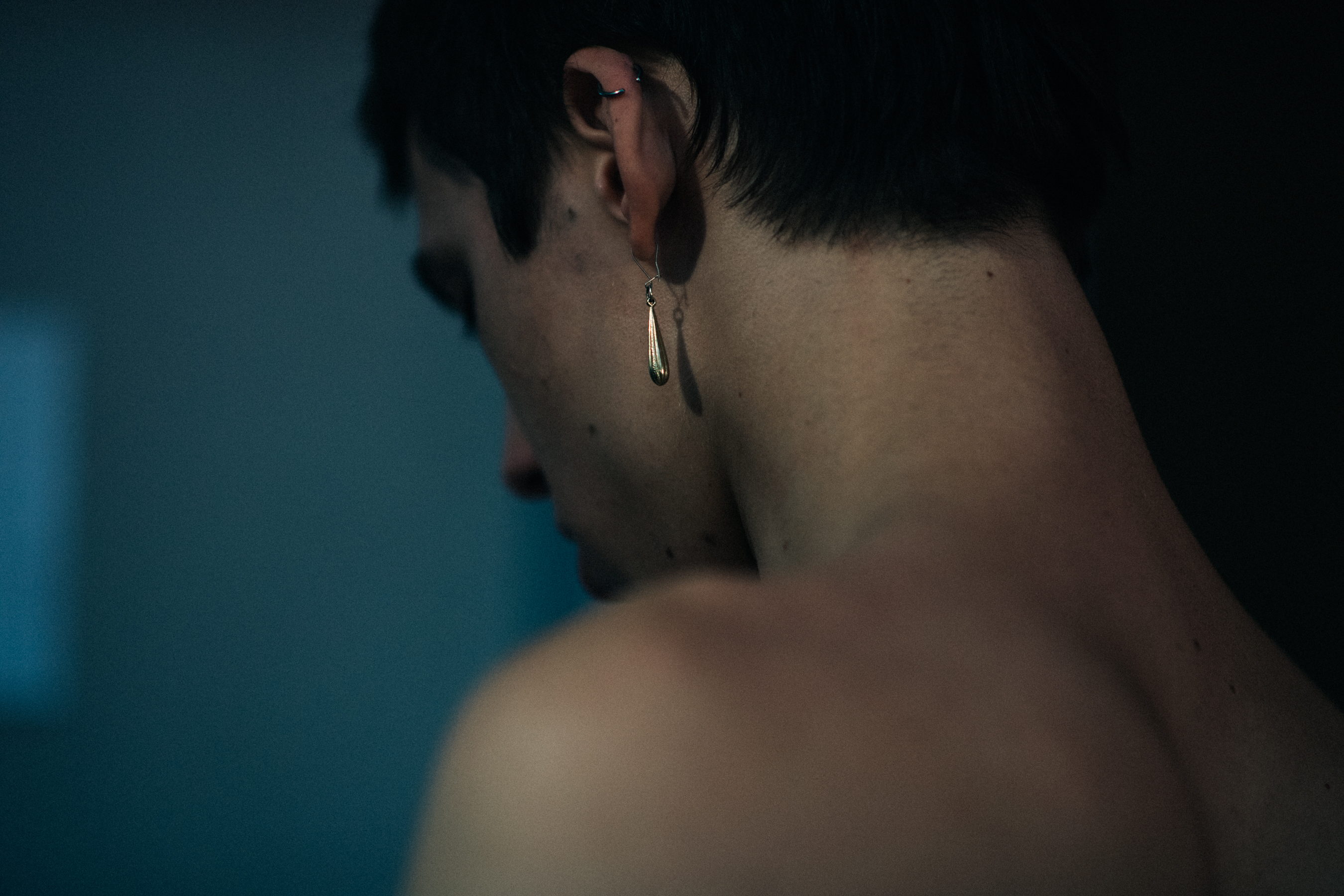 Male model wearing earrings