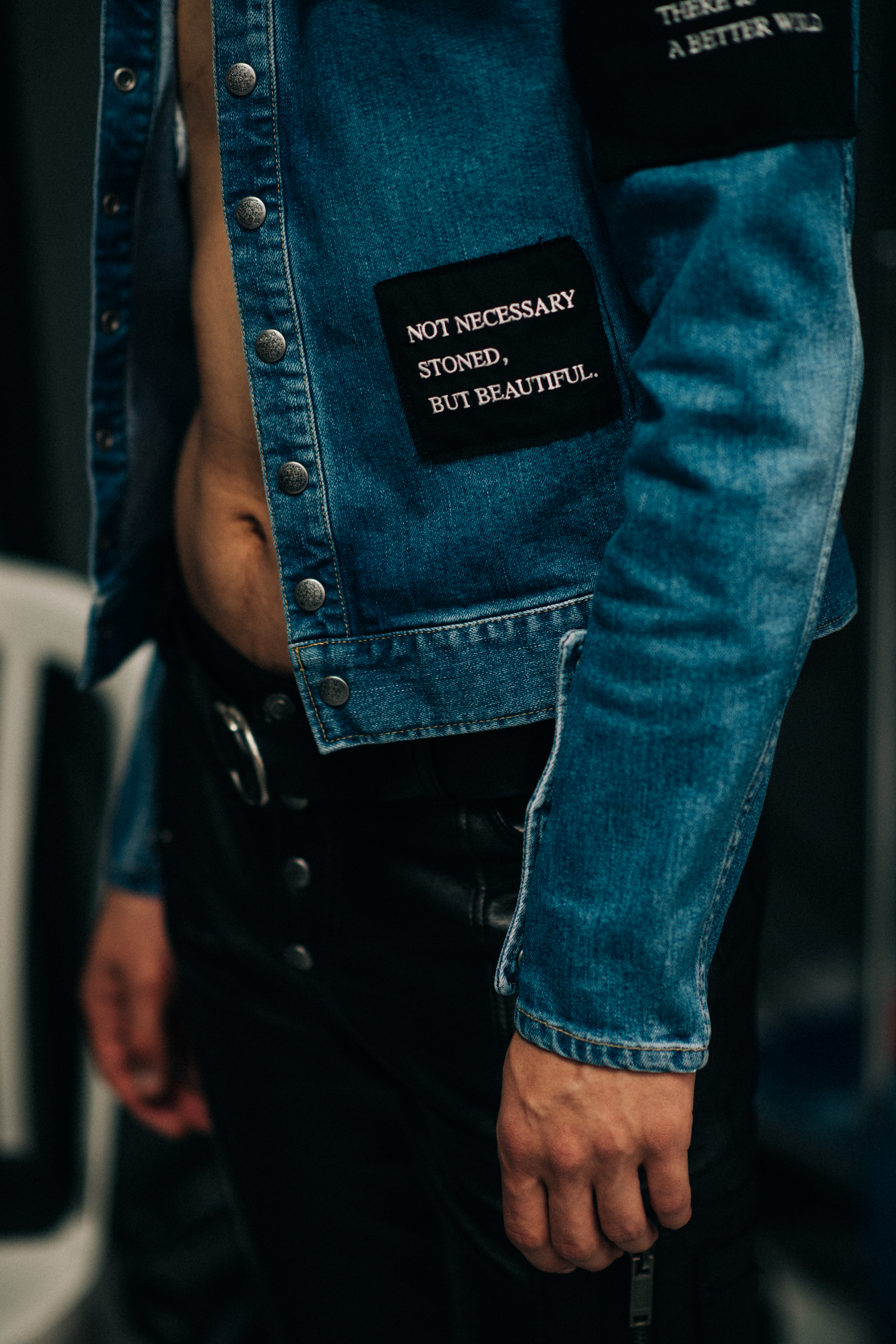 Male model wearing denim jacket