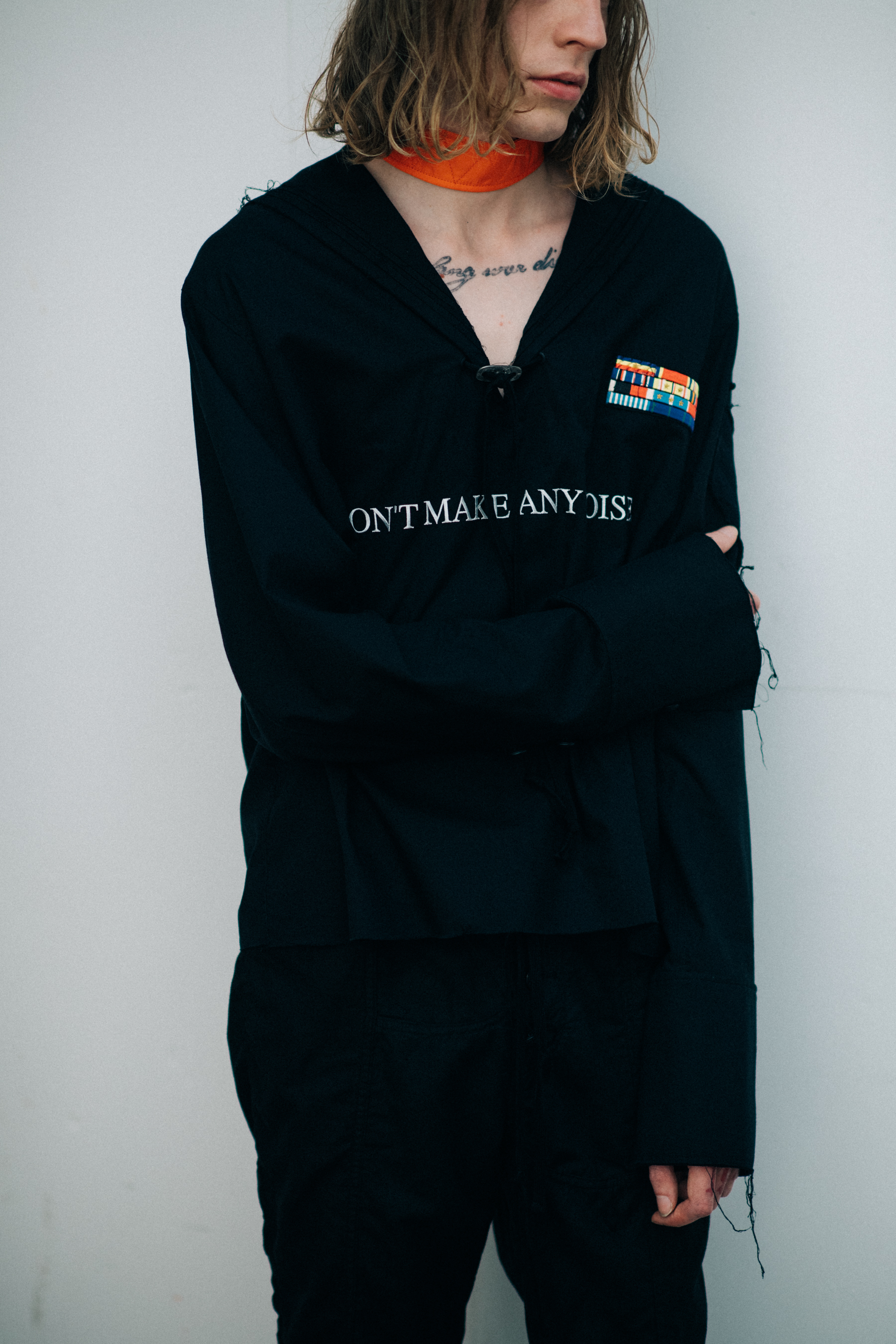 Male model wearing black outfit
