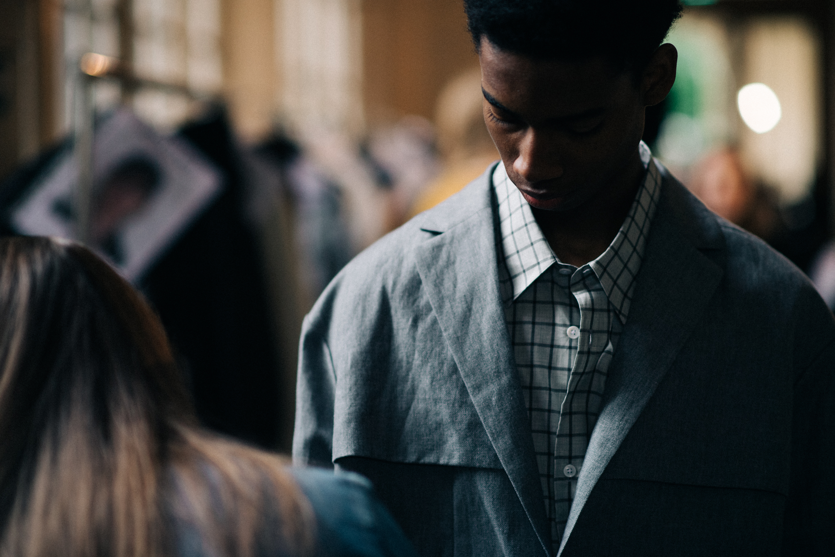 Male model getting ready for show