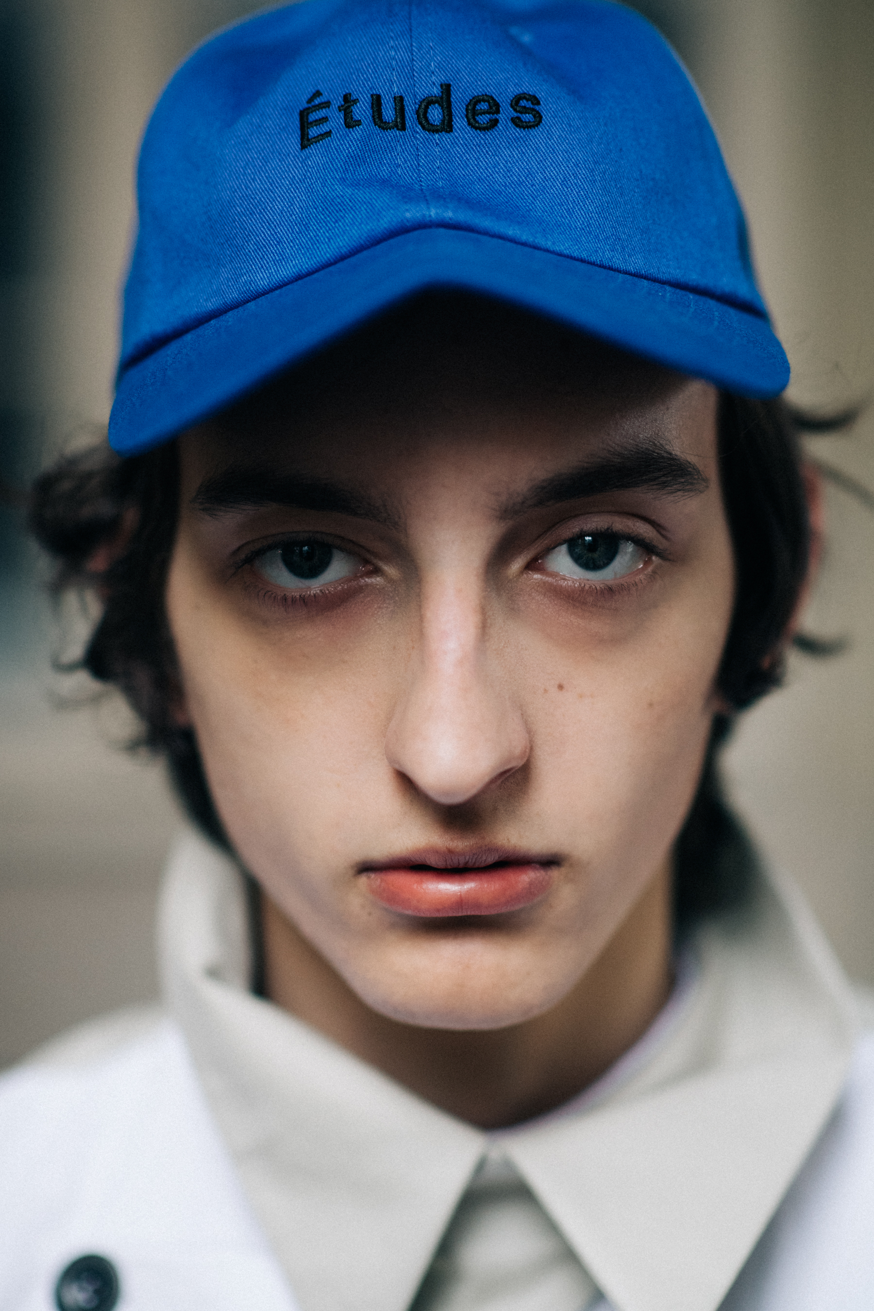 Male model wearing blue cap