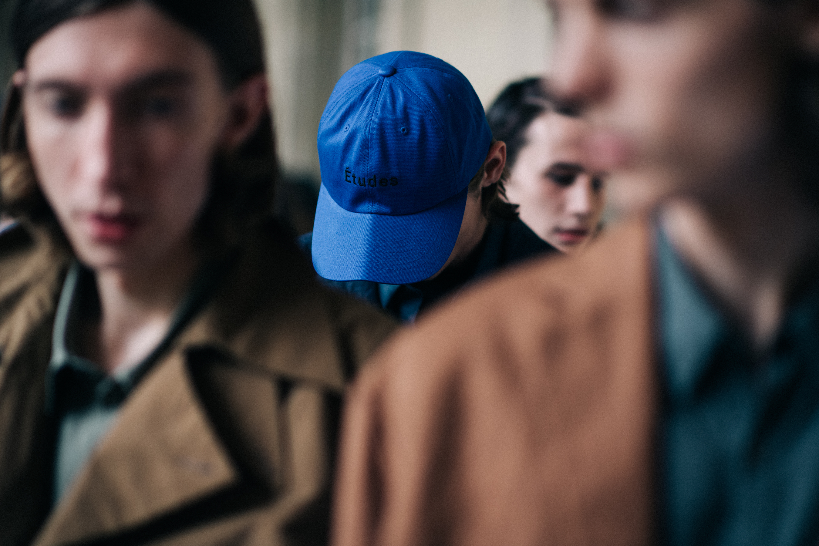Male model wearing blue cap
