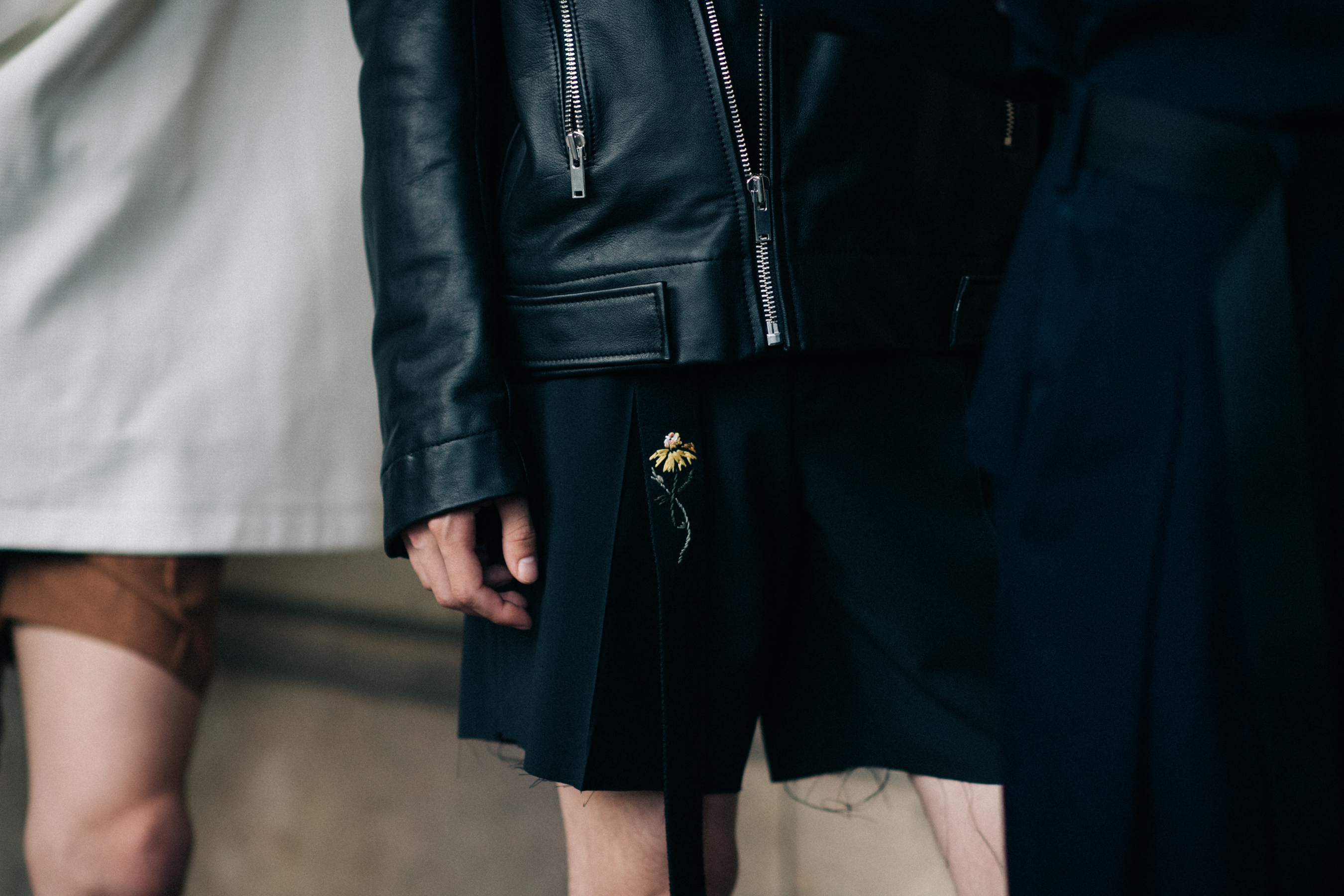 Model in black leather jacket
