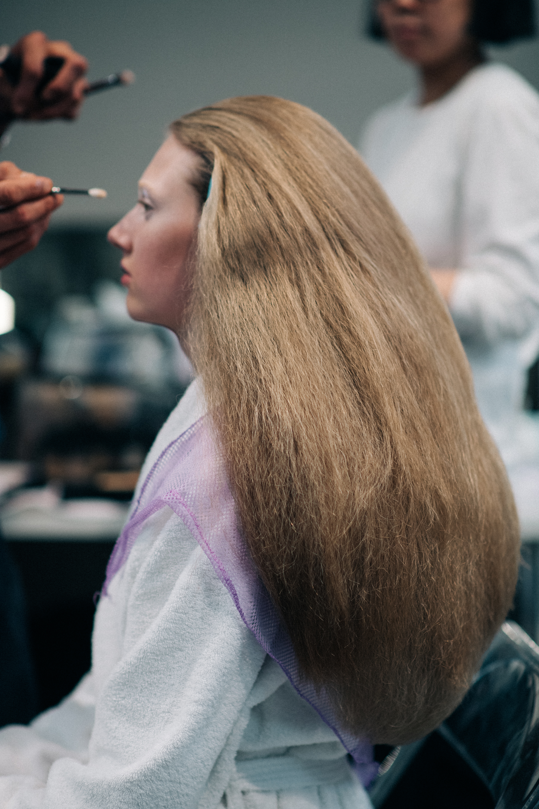 A model getting her make-up done