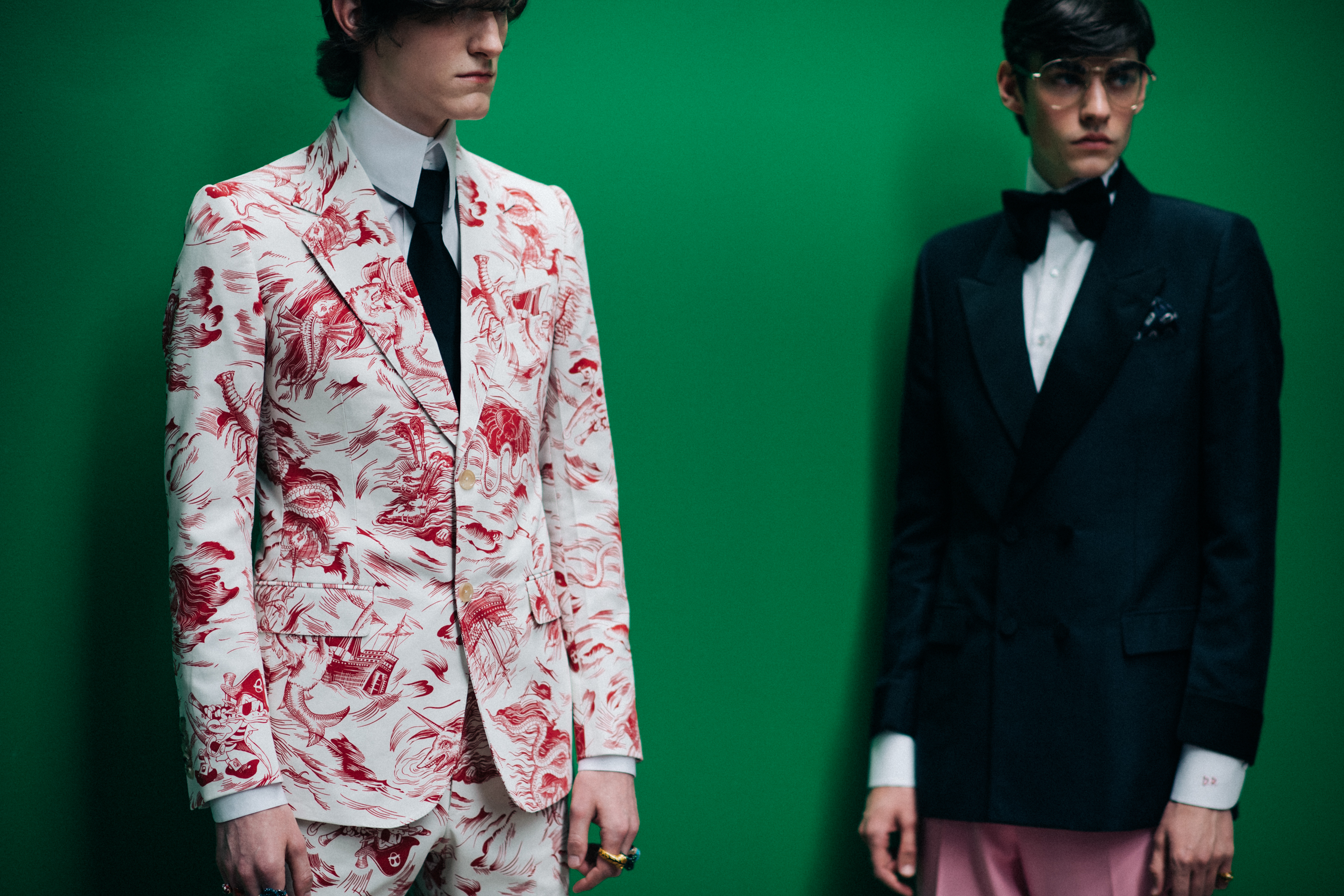 Male models posing before the show