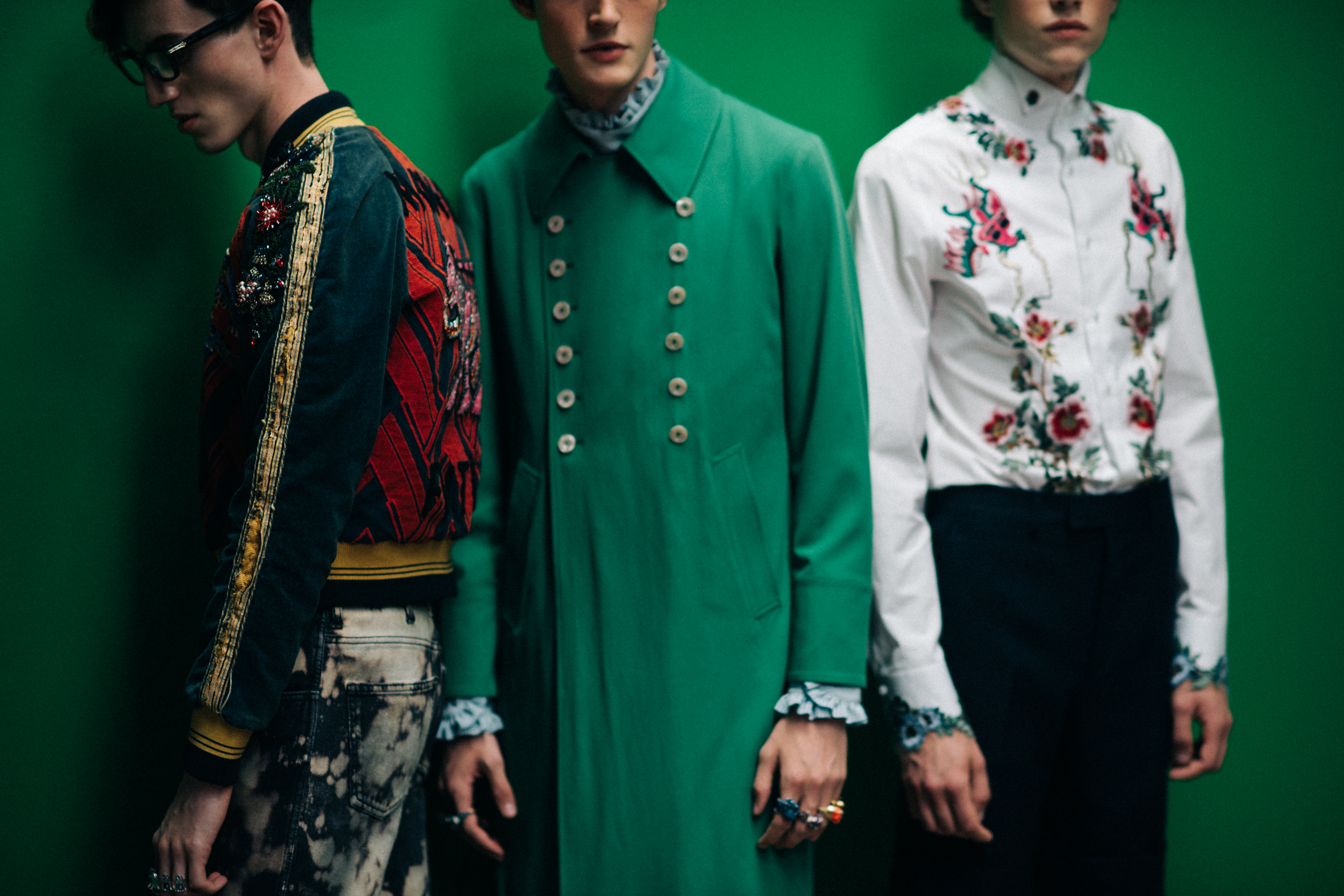 Men in green, red, white outfits