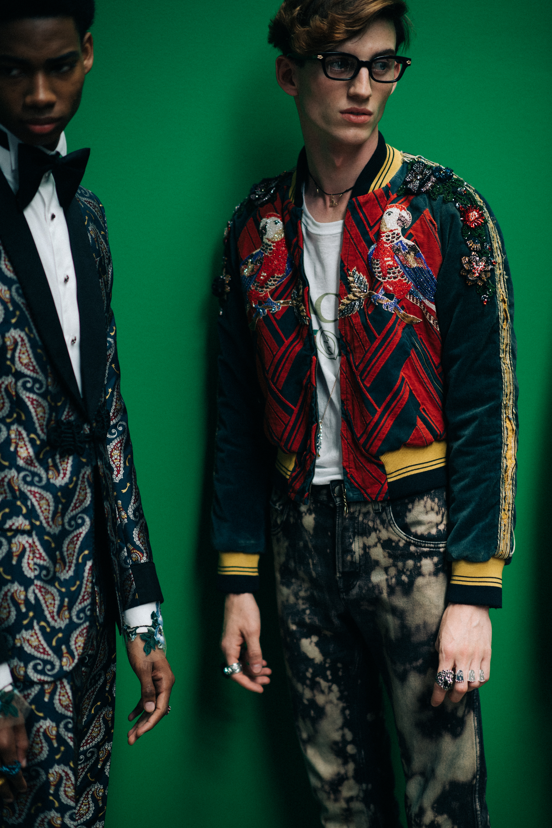 Men in jackets with embroidery