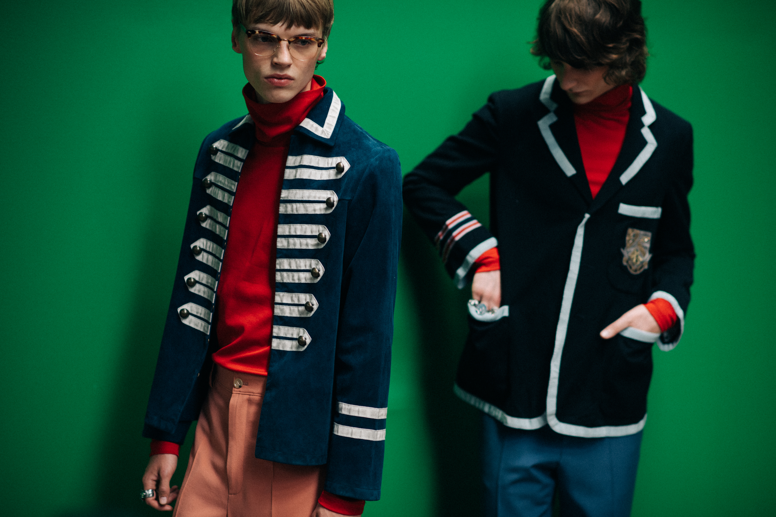 Male models in dark blue jackets