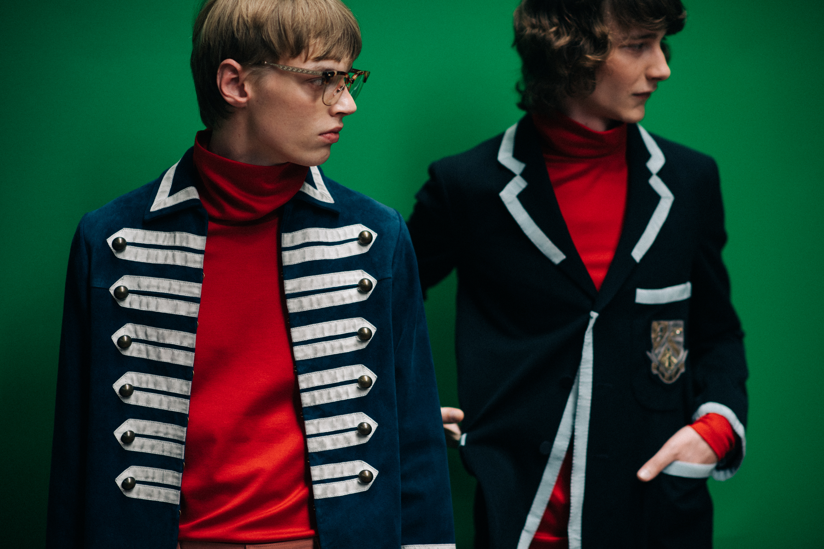 Male models in red turtlenecks