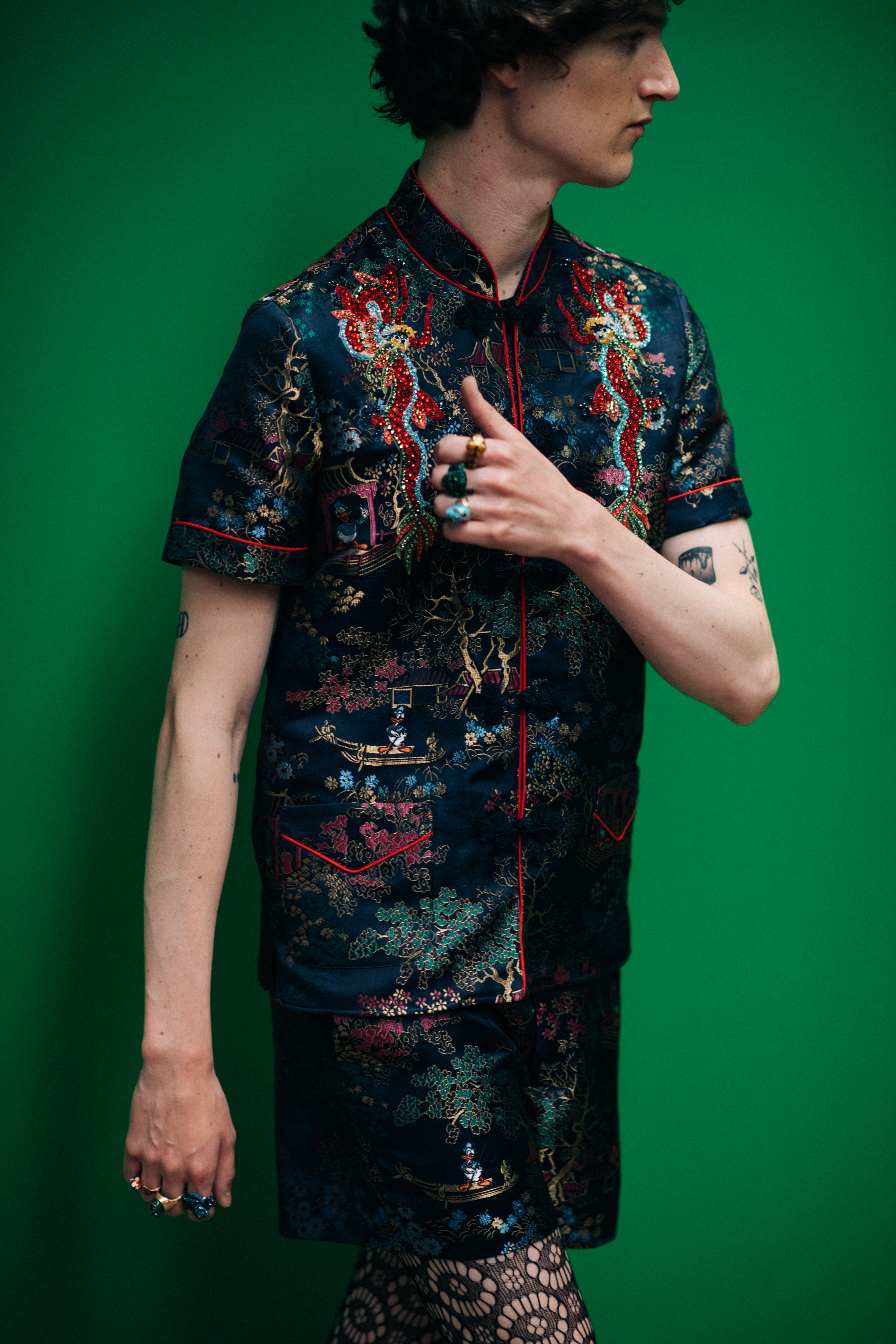 A man in a shirt with embroidery