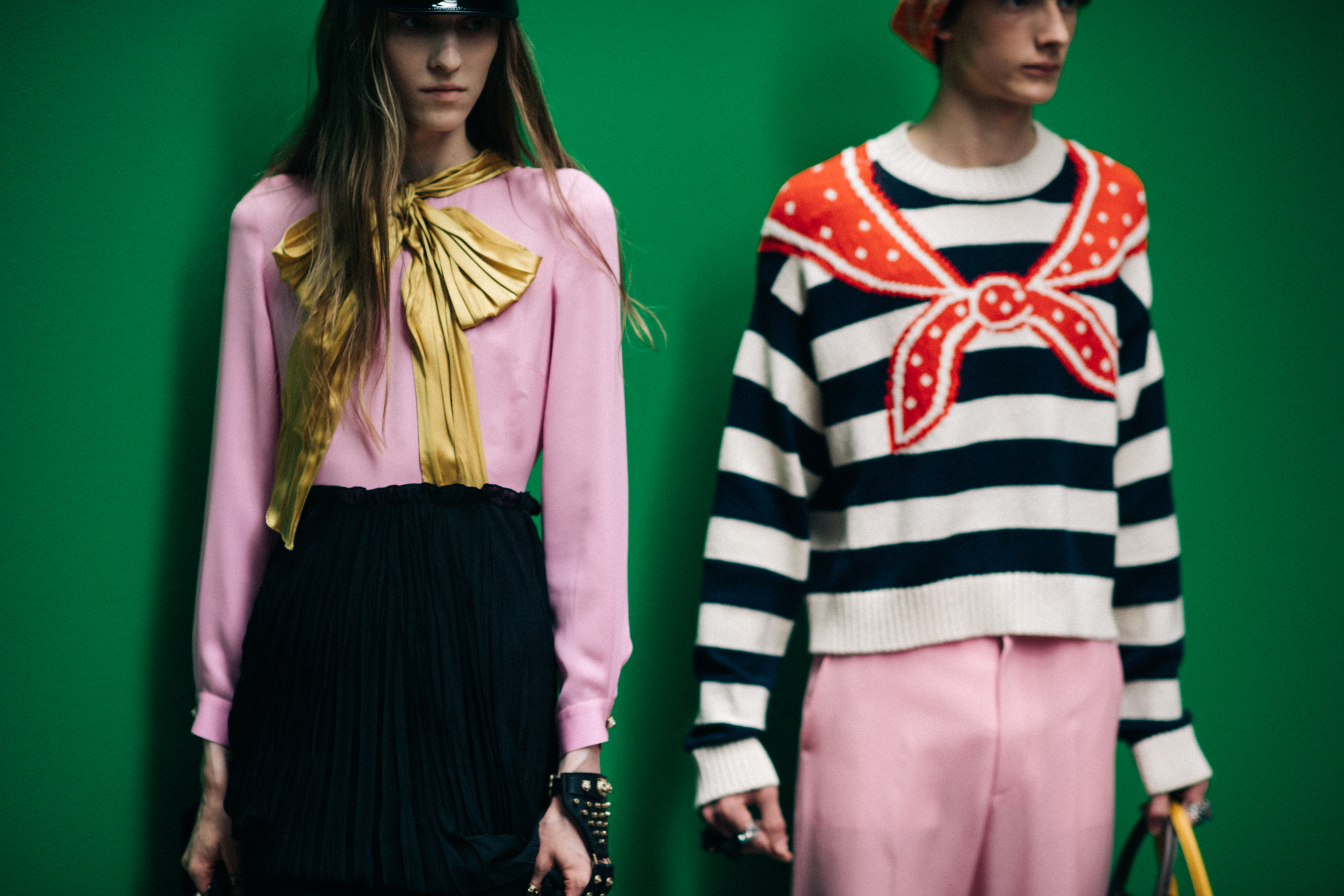 Models wearing pink outfits