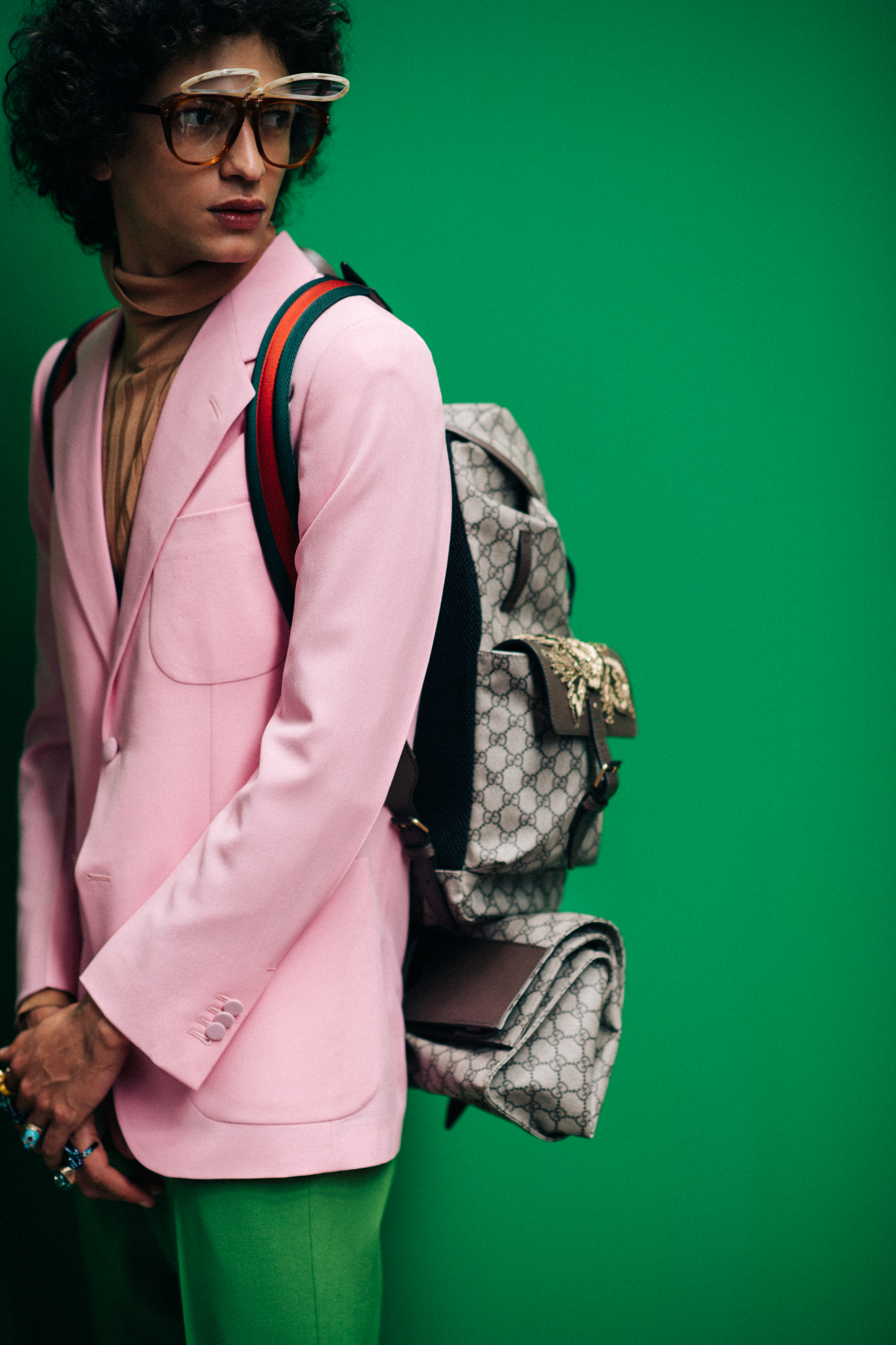 A pink jacket with a backpack