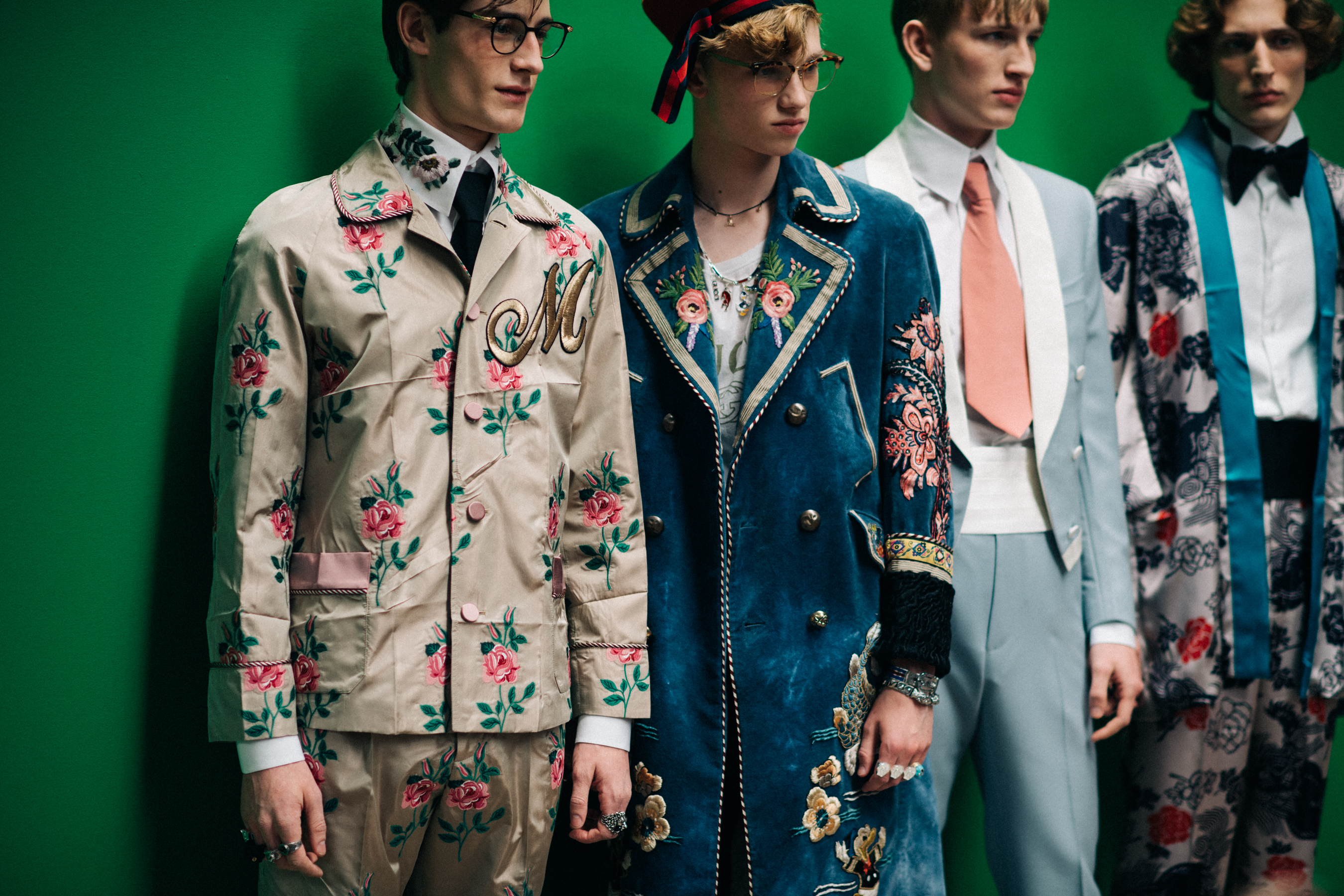 Male models in floral suits