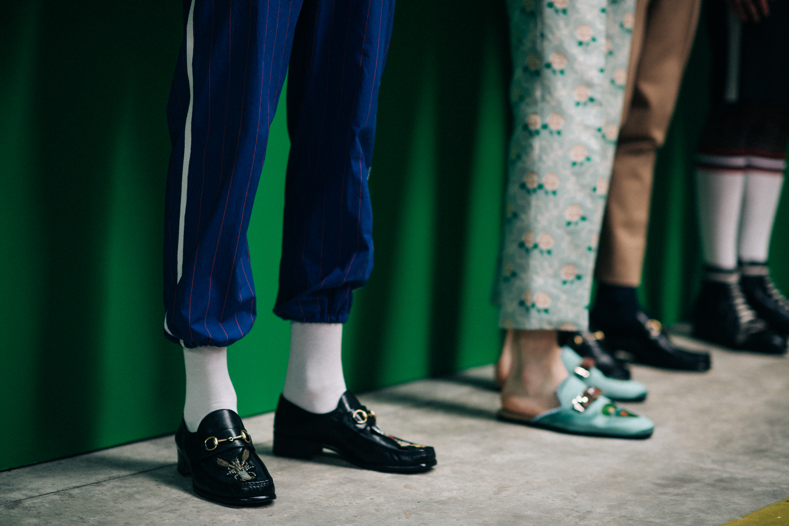 Men wearing trousers and loafers