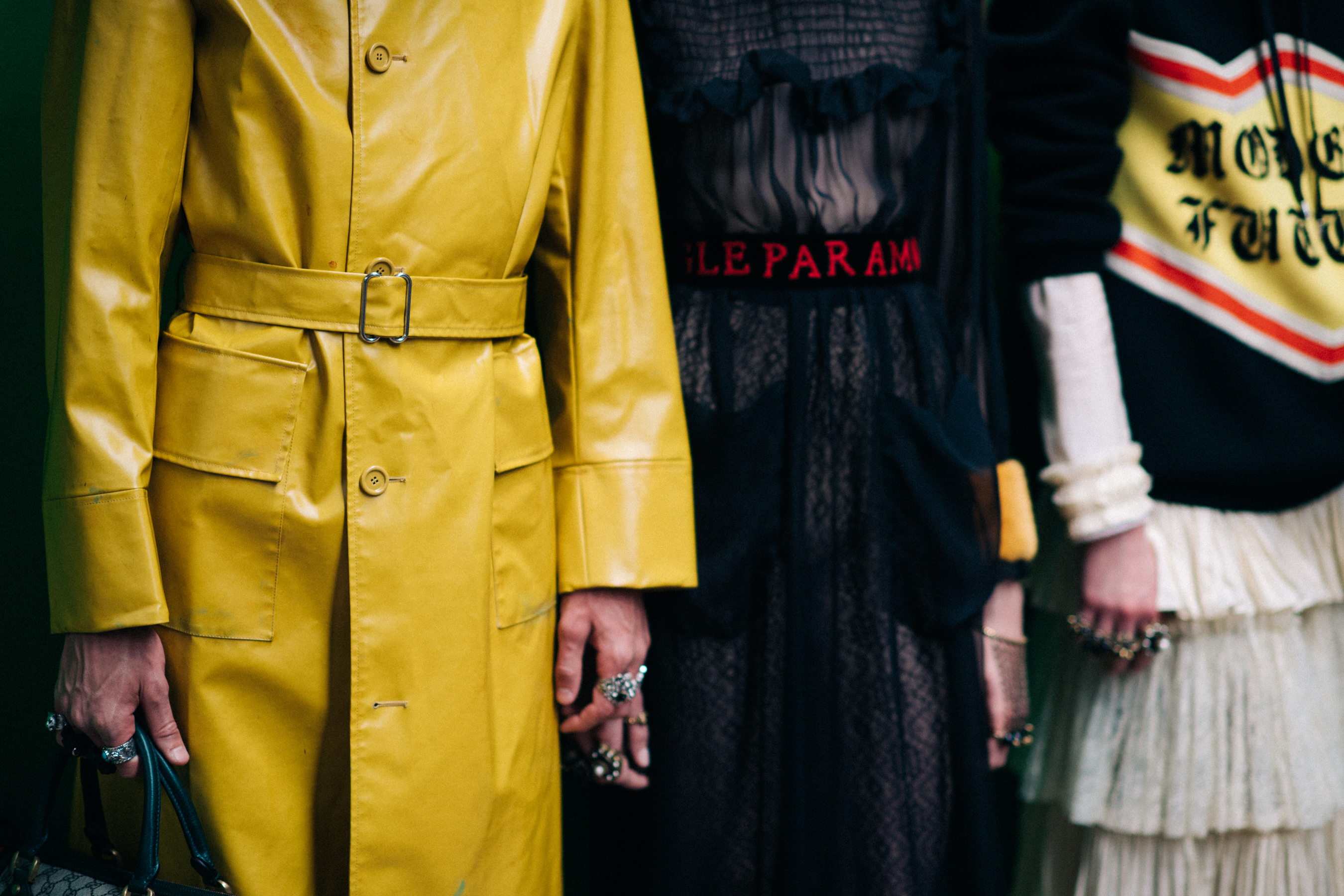 Yellow coat and a black dress