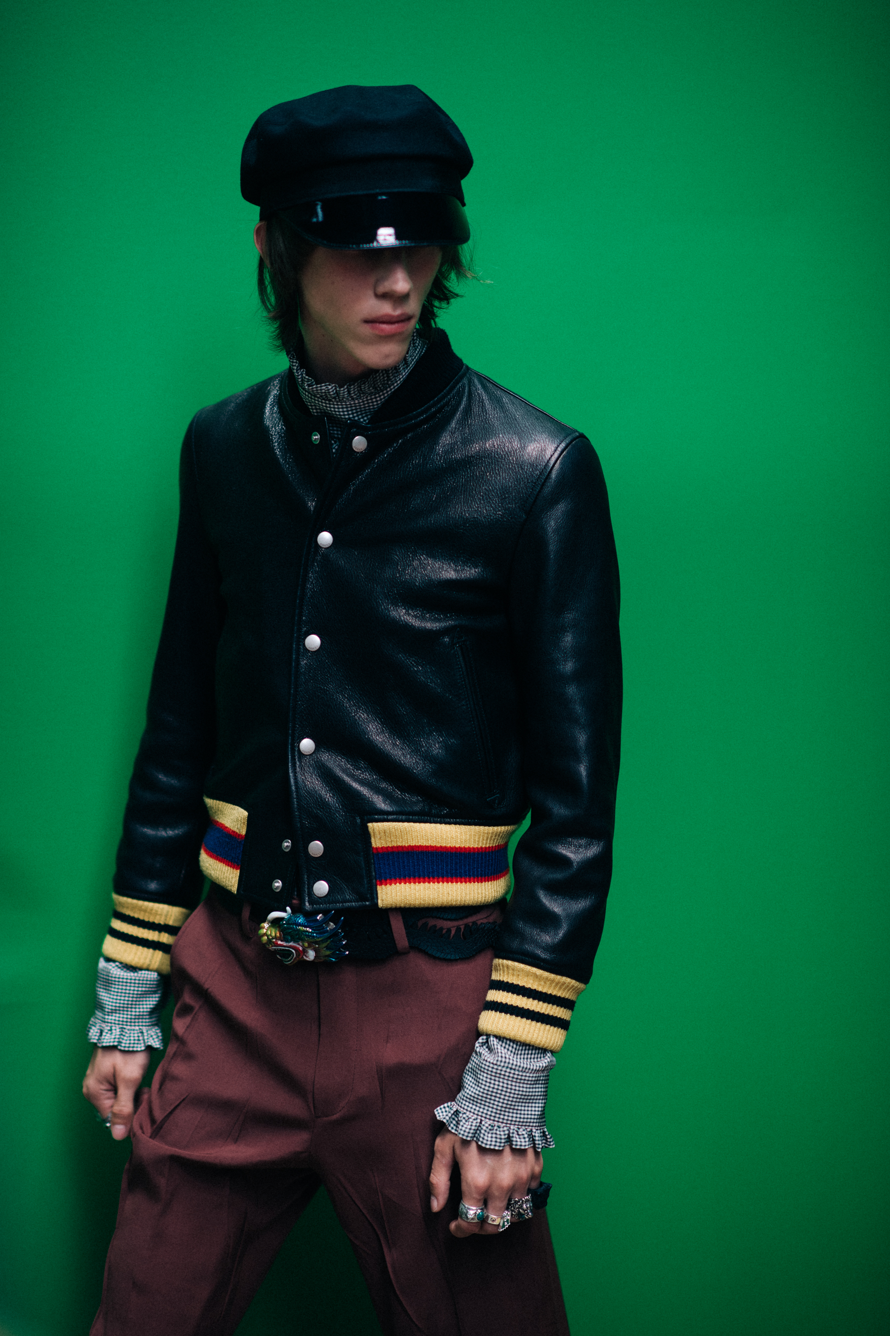 A man in a black leather jacket