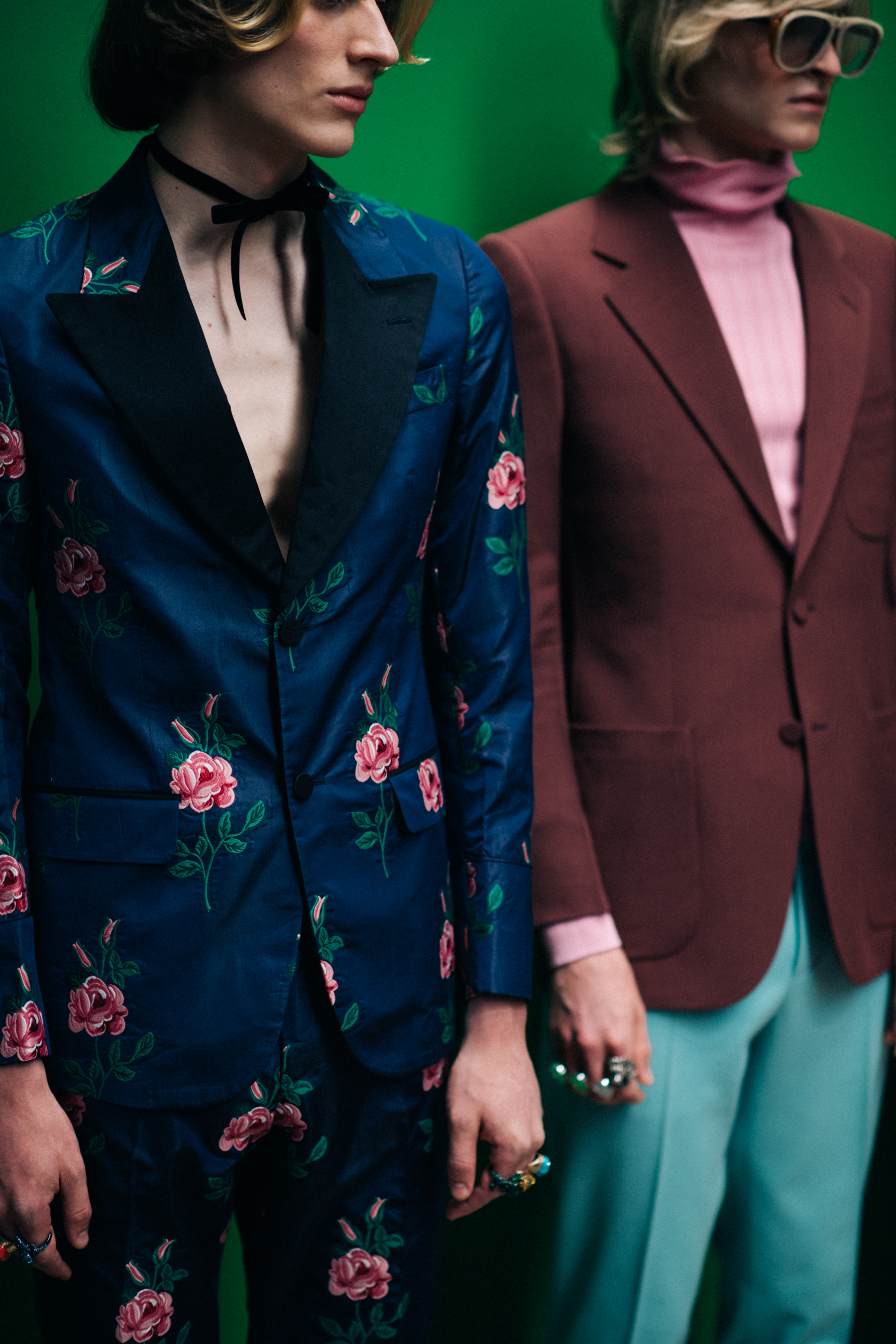 Male model wearing colourful suits
