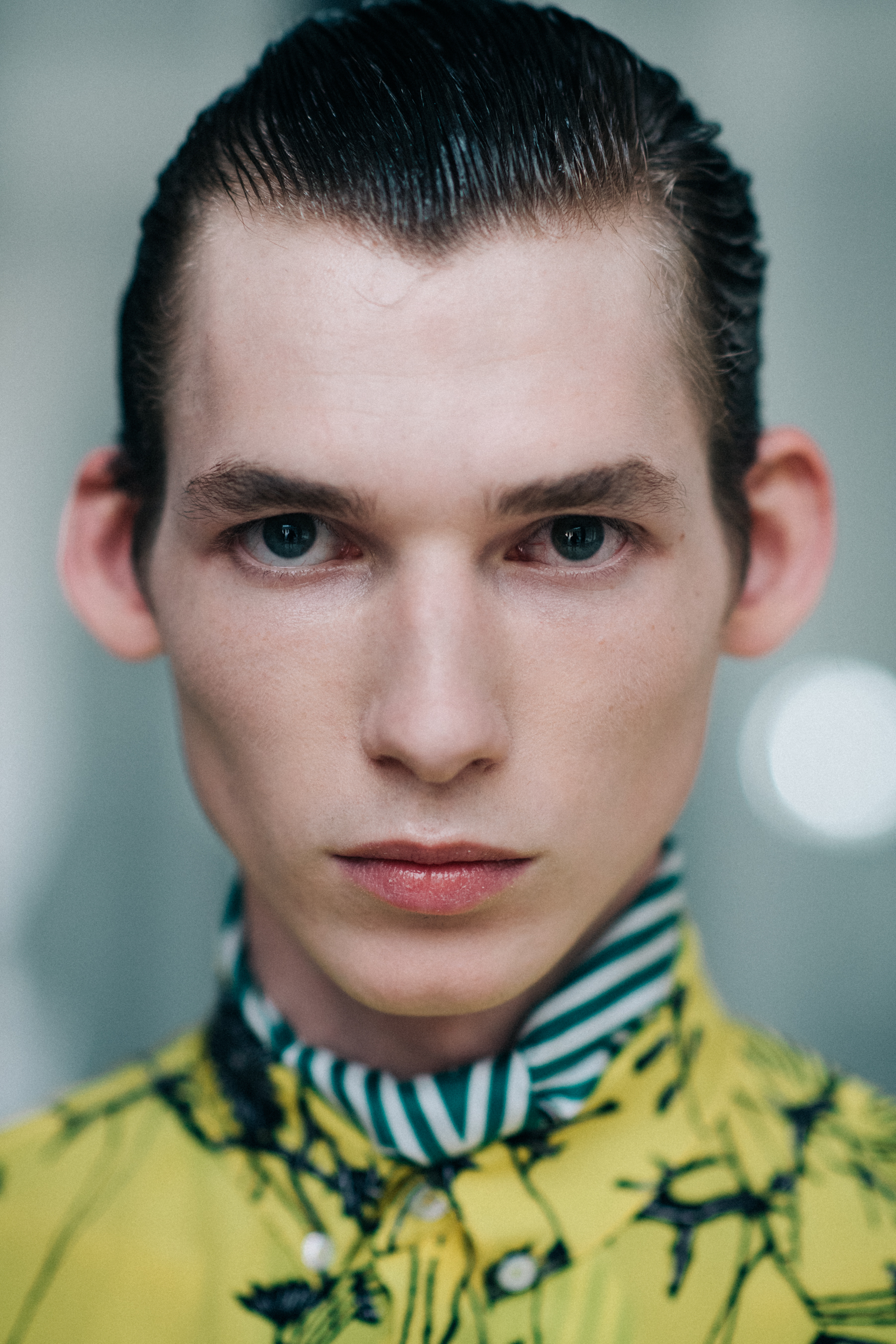 Portrait of a model in a yellow jacket