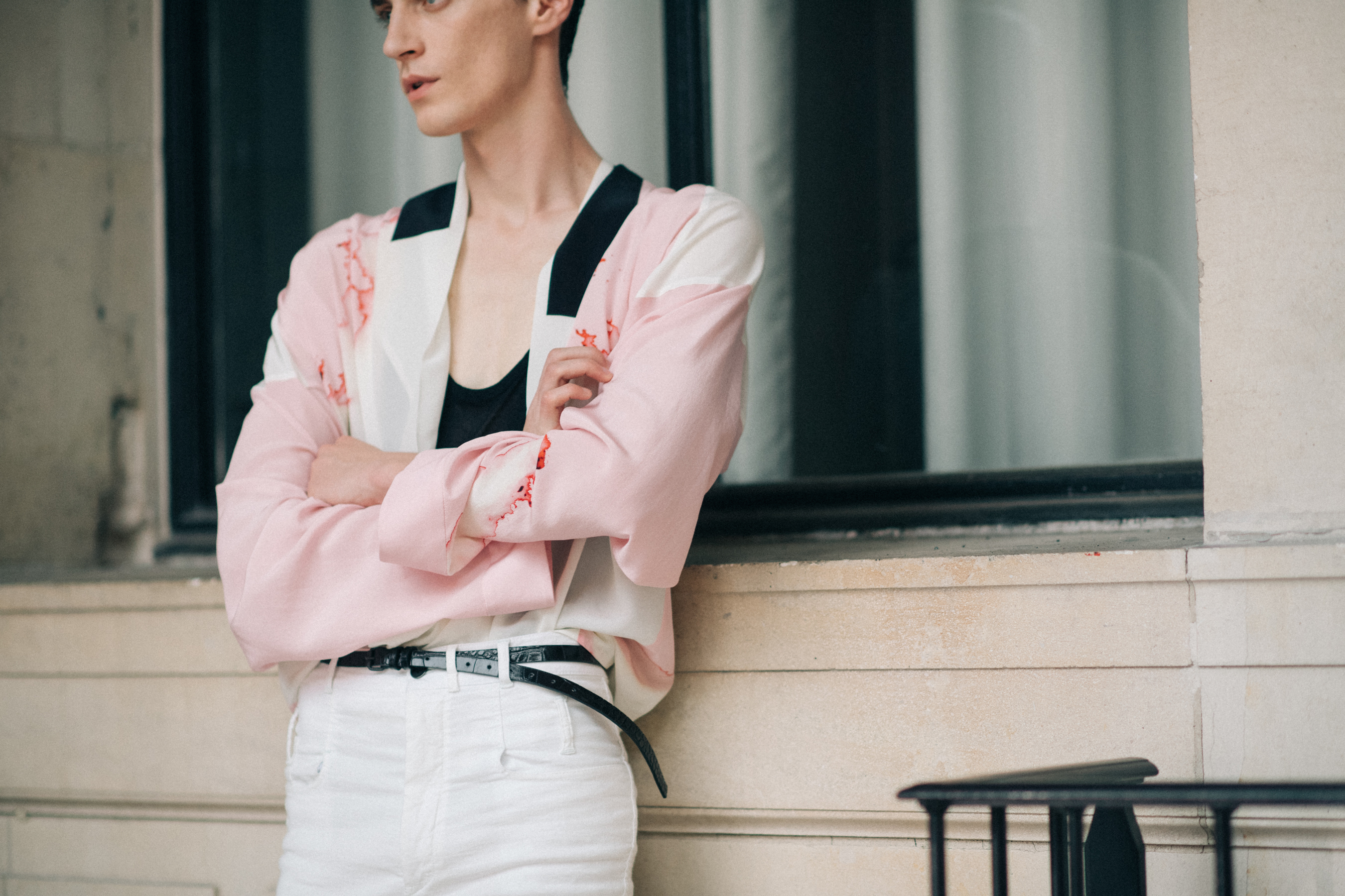 A model wearing a pink jacket