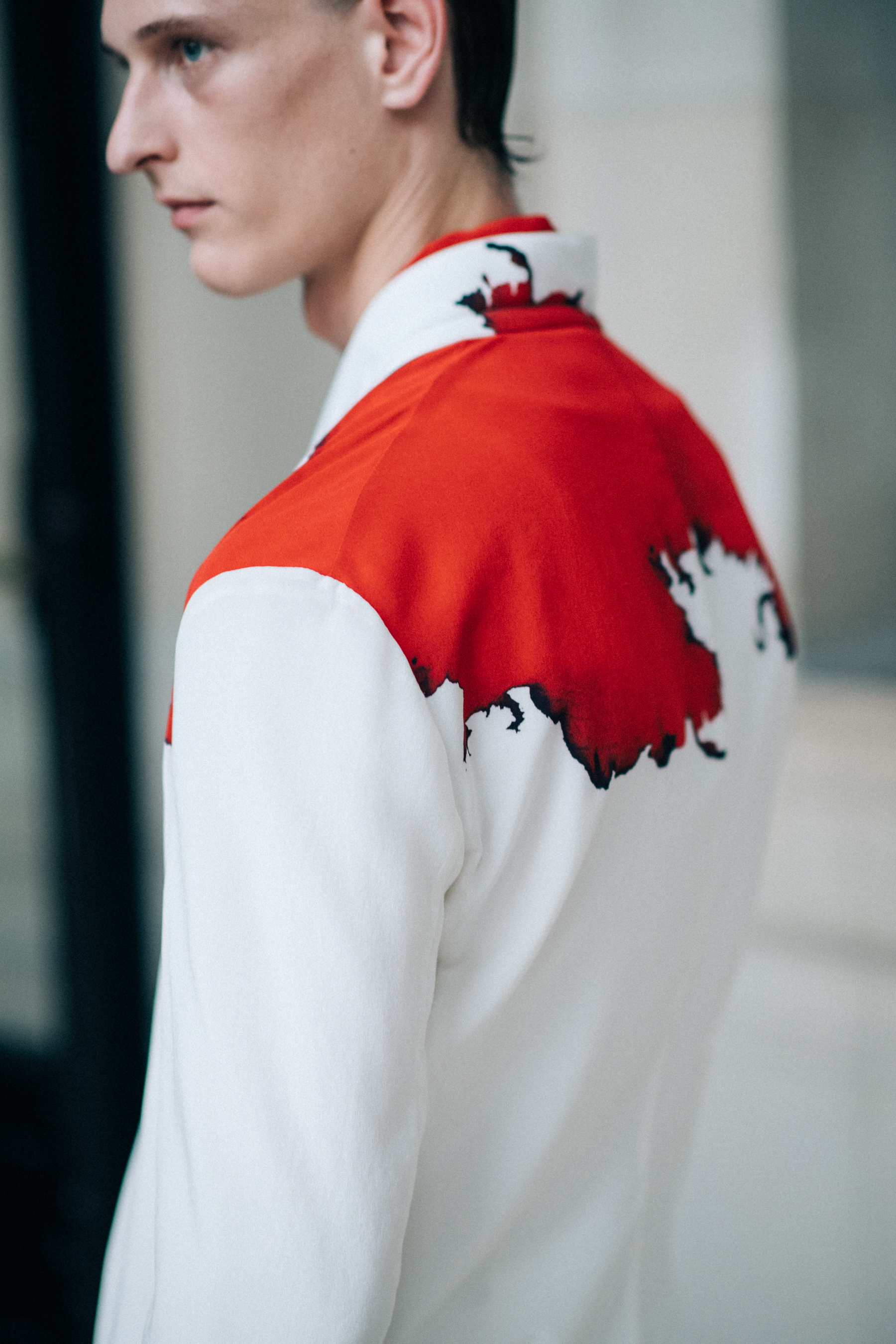 A white jacket with red details