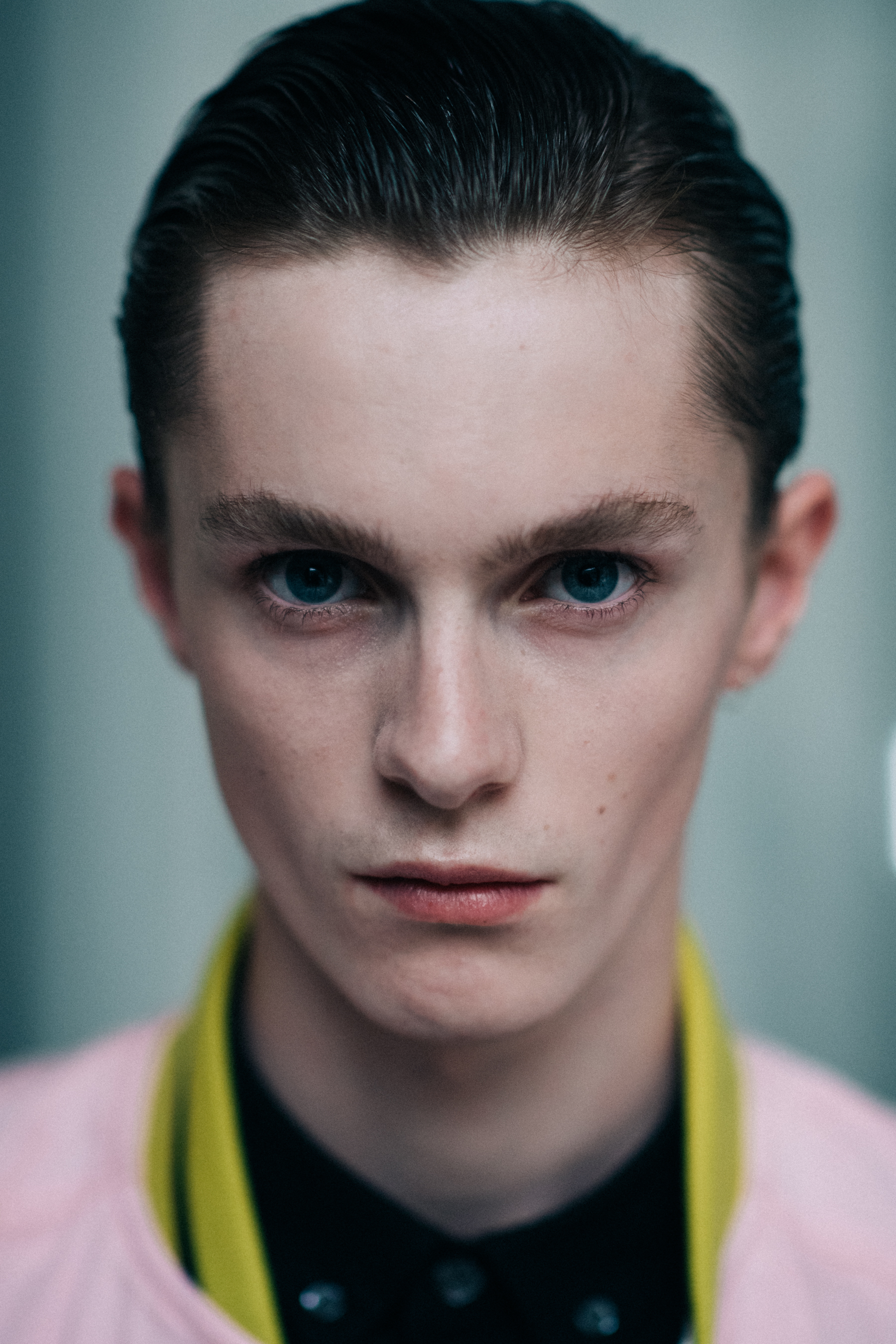 Portrait of a model in a yellow shirt
