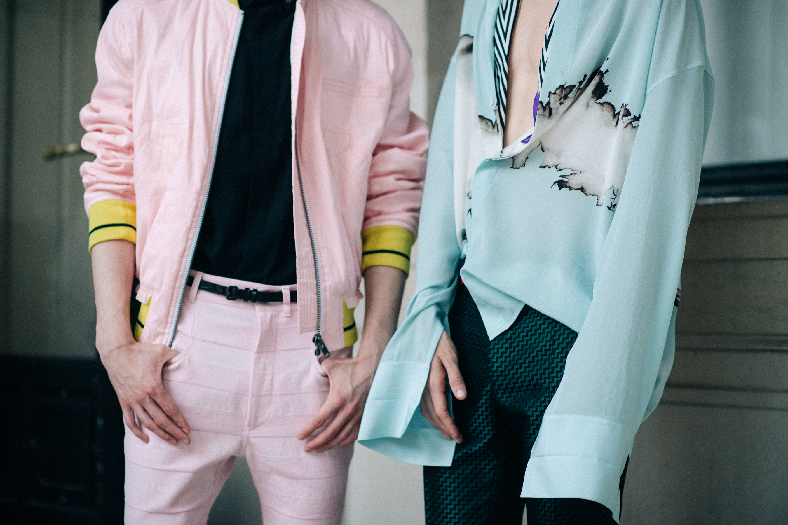 Models wearing pink and light blue
