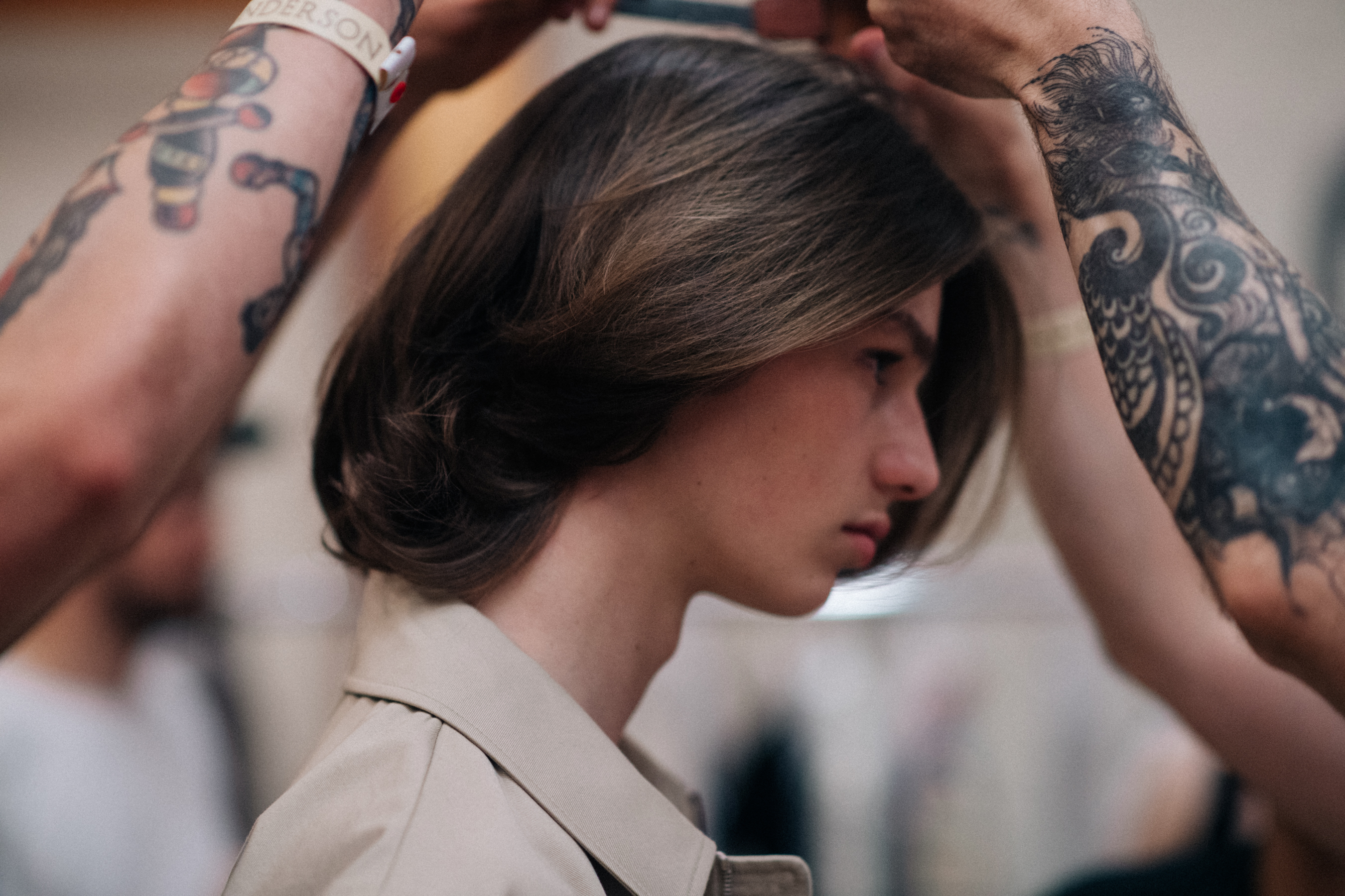 Male model`s hair being done