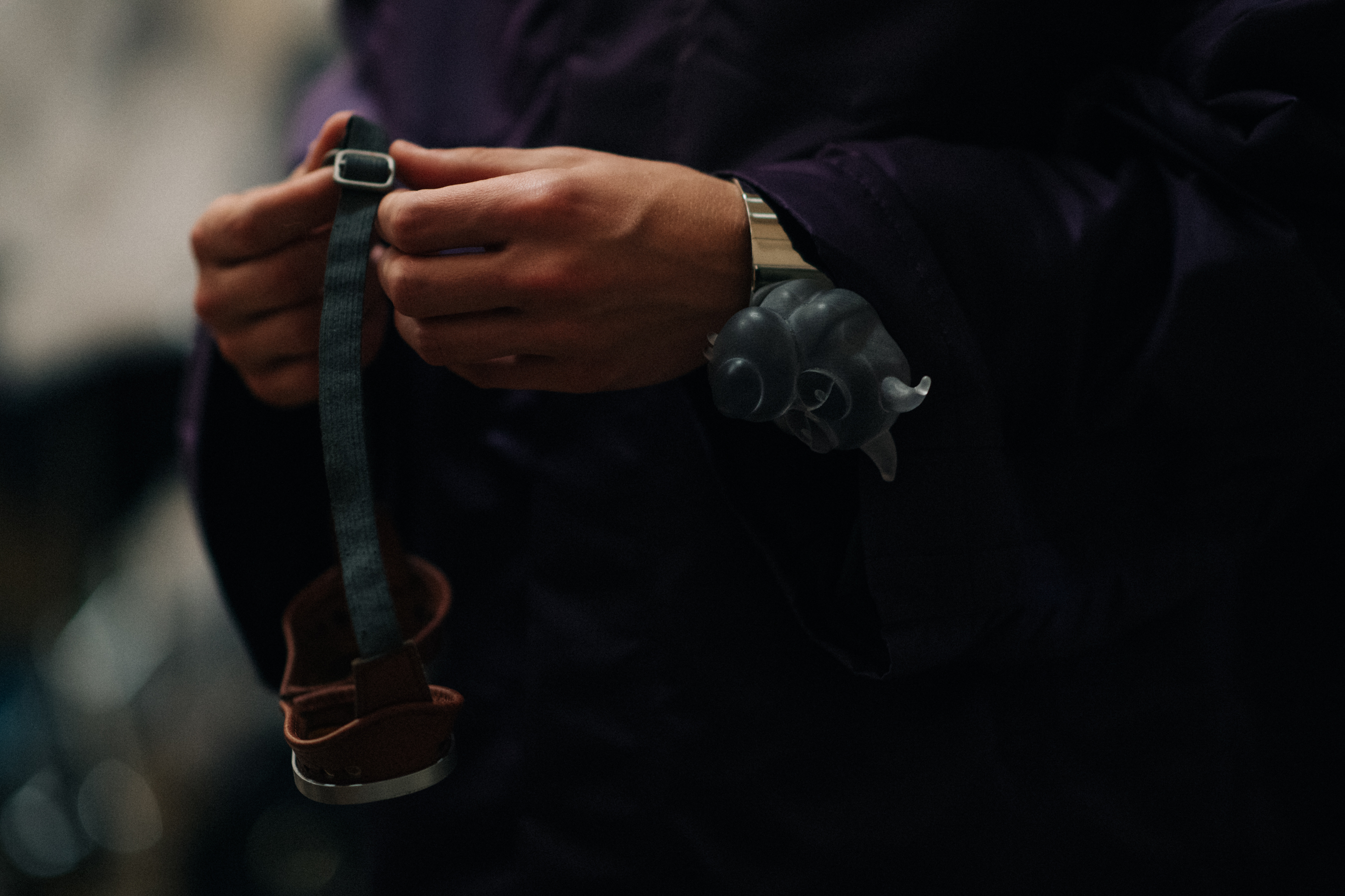 Hands of a man fixing accessories