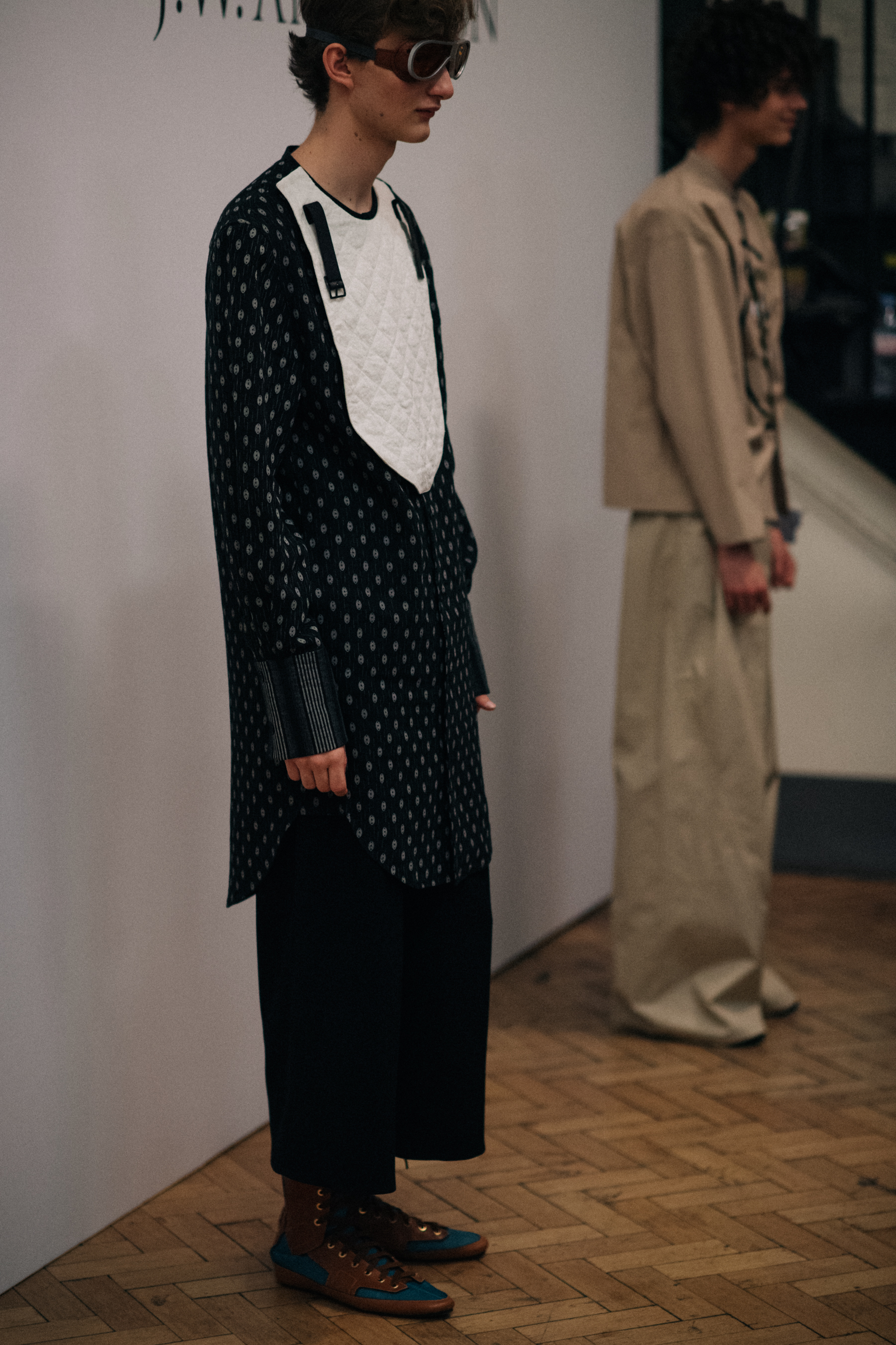 Two models posing before the show