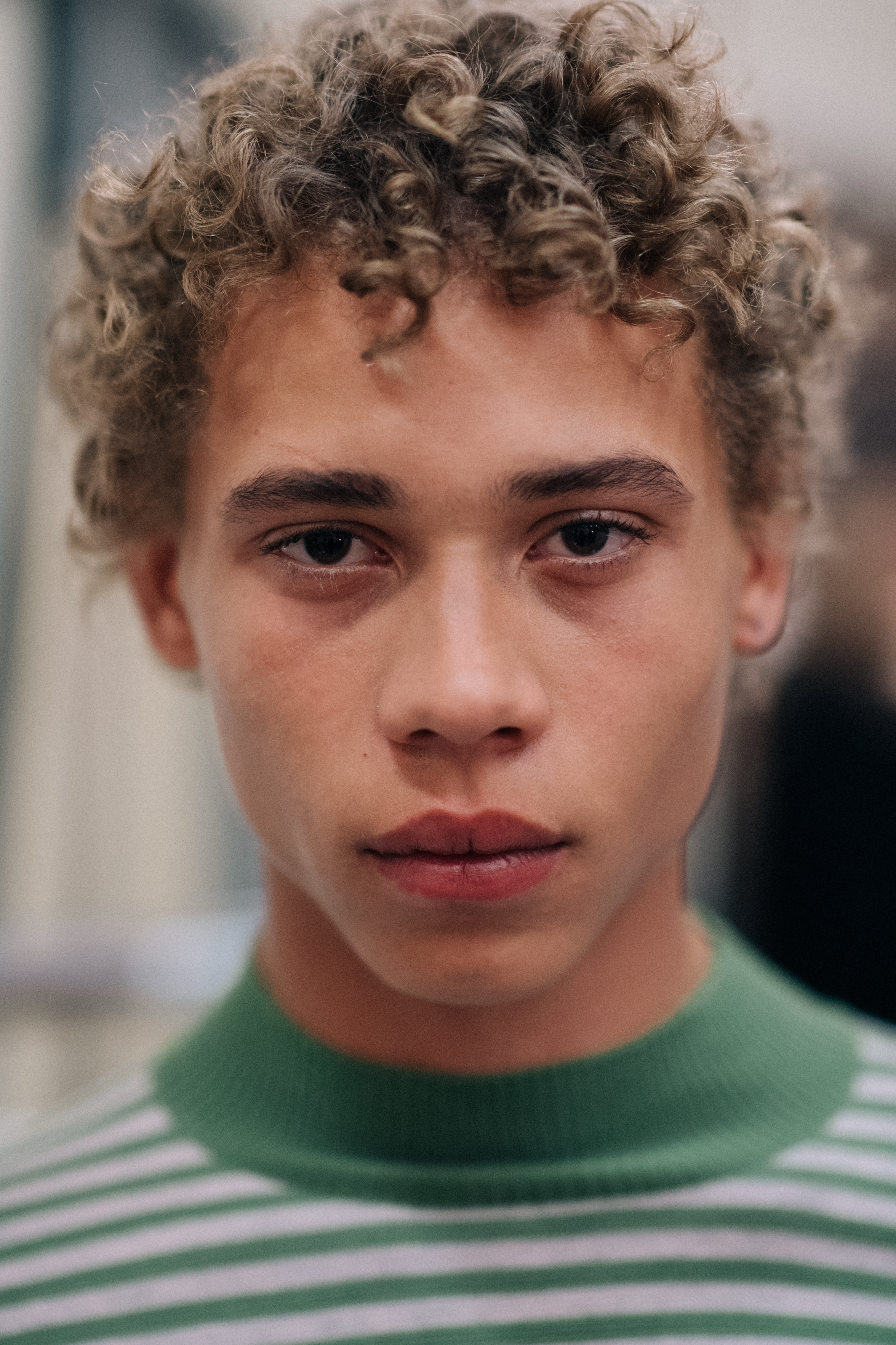 Curly-haired blond man
