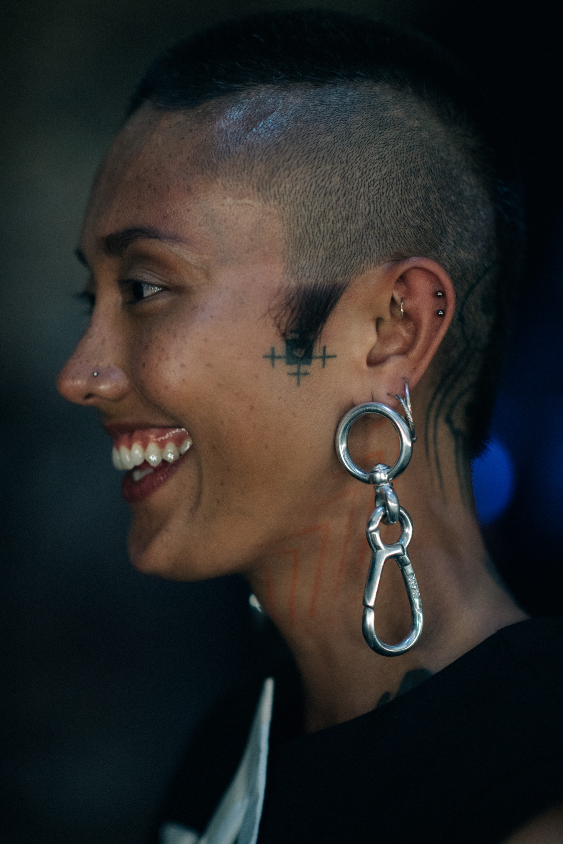 A model with huge silver earrings