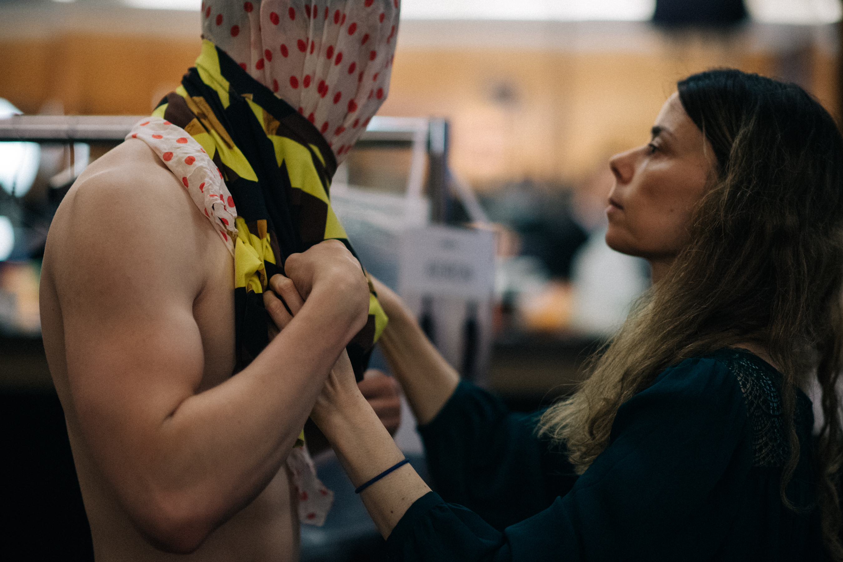 Male model quickly getting dressed