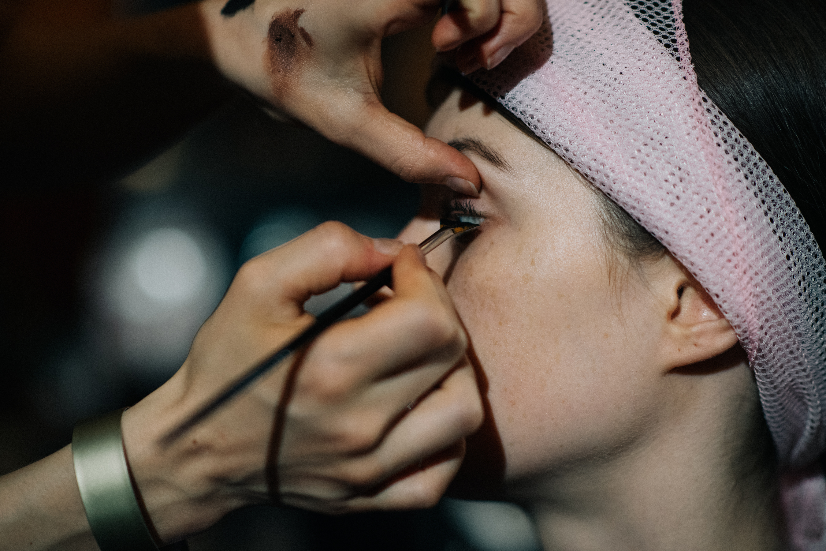 Female model getting make-up done