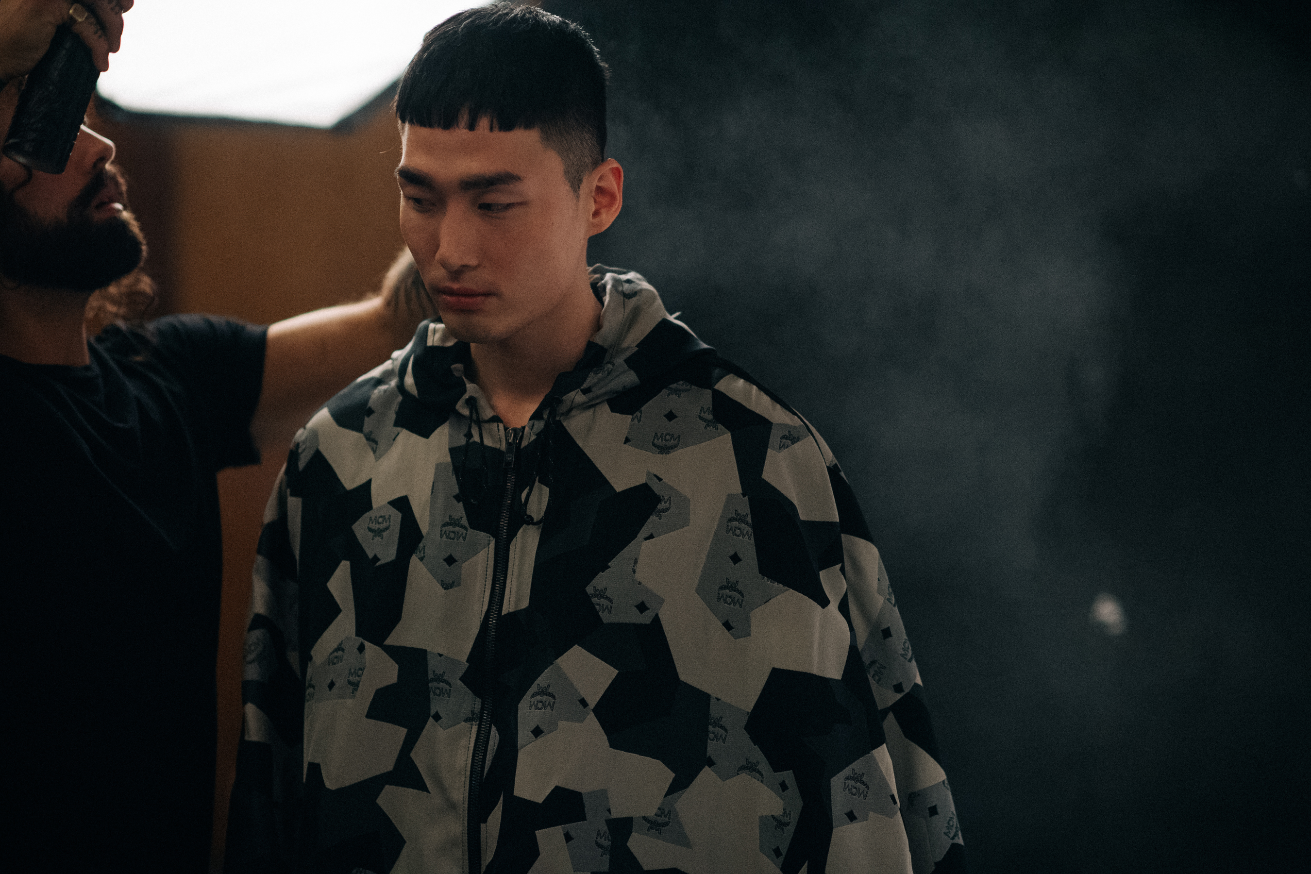 Asian male model getting ready